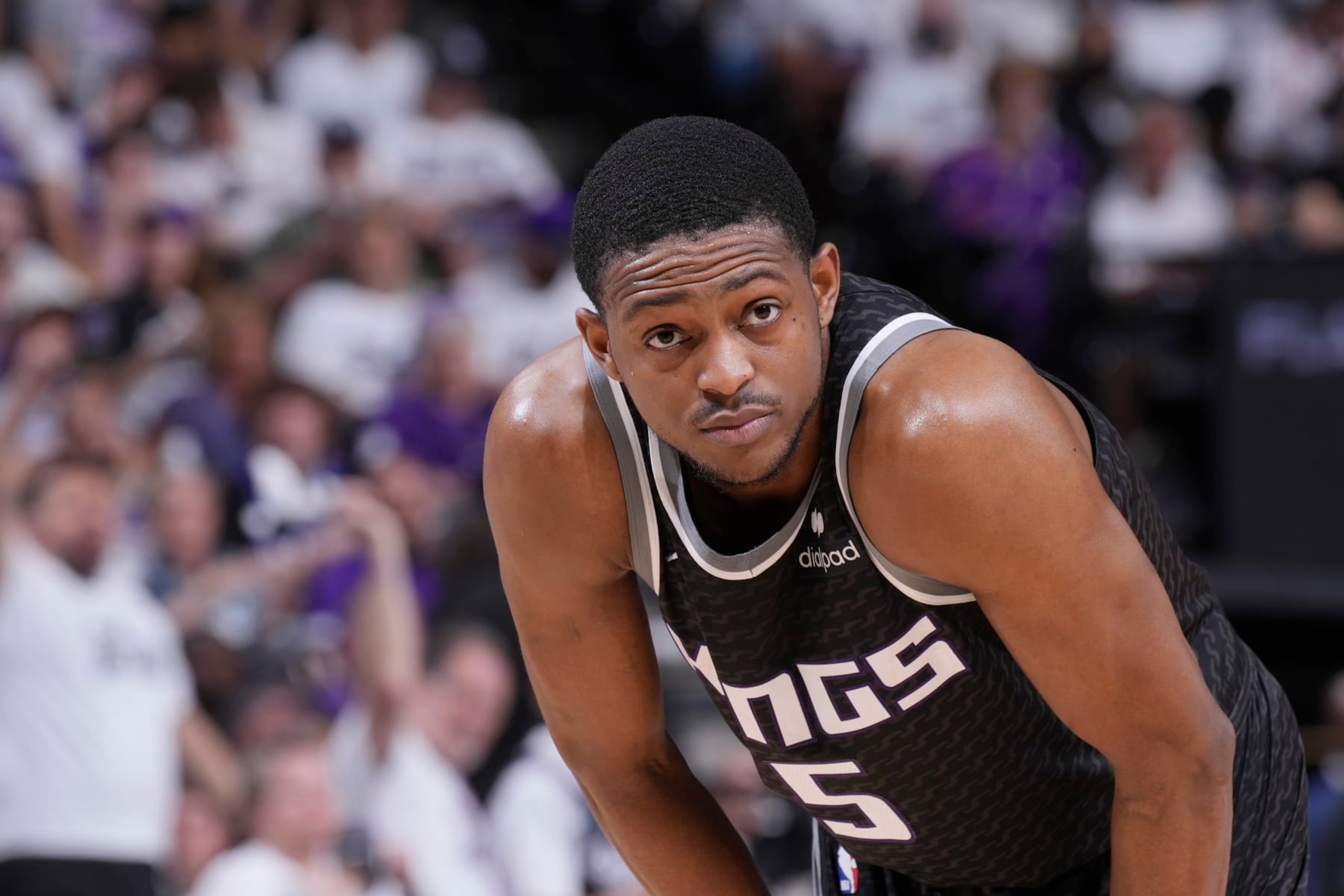 SACRAMENTO, CA - APRIL 30: De'Aaron Fox #5 of the Sacramento Kings looks on during the game against the Golden State Warriors during Round 1 Game 7 of the 2023 NBA Playoffs on April 30, 2023 at Golden 1 Center in Sacramento, California. NOTE TO USER: User expressly acknowledges and agrees that, by downloading and or using this photograph, User is consenting to the terms and conditions of the Getty Images Agreement. Mandatory Copyright Notice: Copyright 2023 NBAE (Photo by Rocky Widner/NBAE via Getty Images)