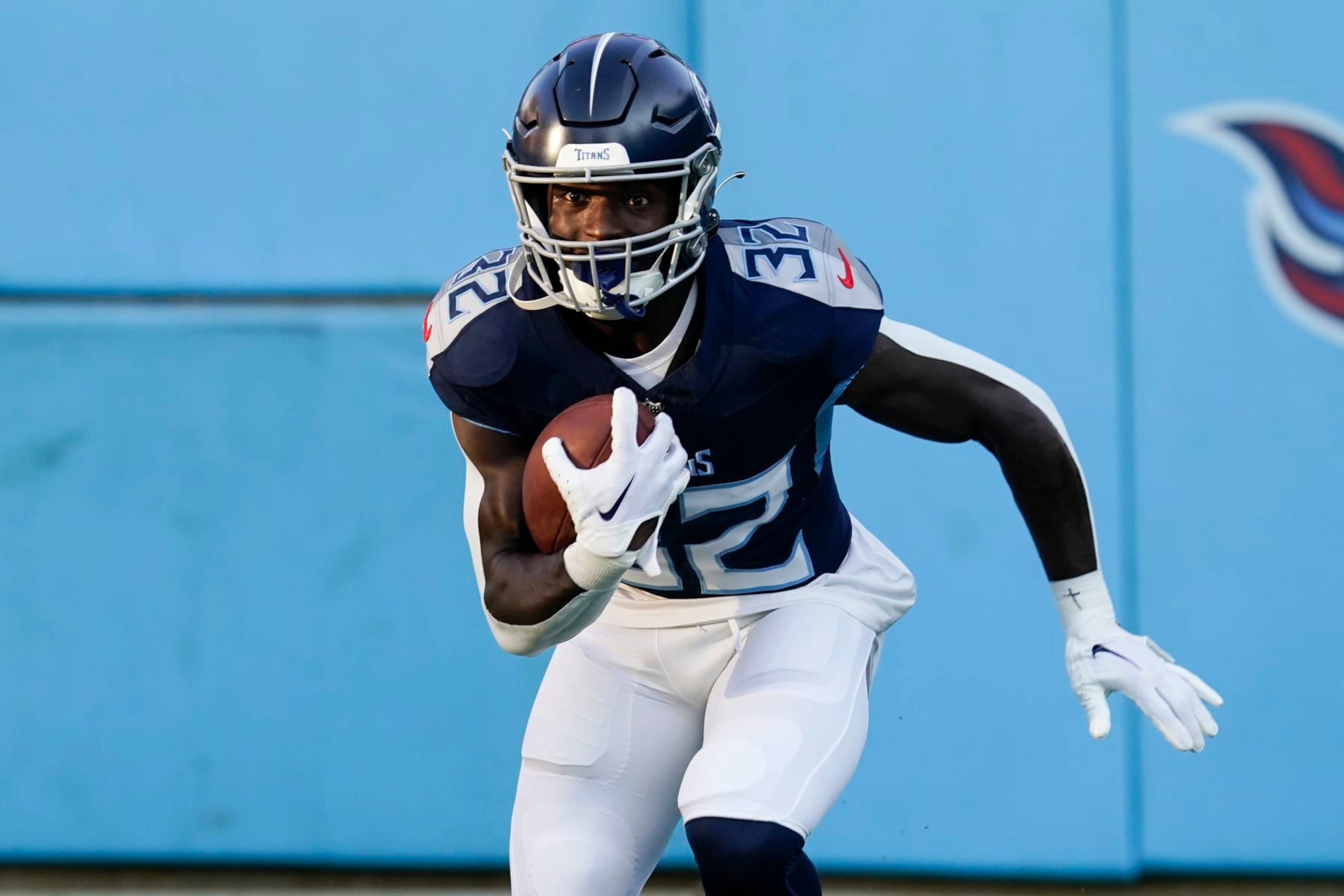 Tennessee Titans running back Tyjae Spears (32) warms up before an NFL preseason football game against the New England Patriots, Friday, Aug. 25, 2023, in Nashville, Tenn. (AP Photo/George Walker IV)