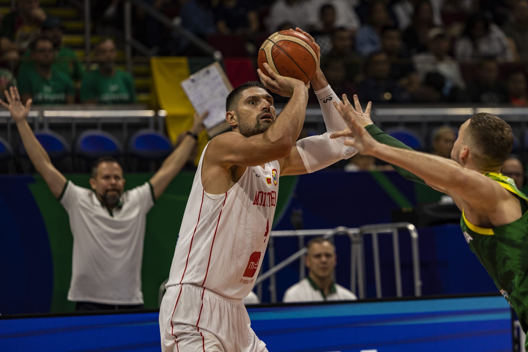 MANILA, PHILIPPINES - AUGUST 29: Nikola Vucevic #4 of Montenegro shoots the ball during the FIBA Basketball World Cup Group D game between Montenegro and Lithuania at Mall of Asia Arena on August 29, 2023 in Pasay, Metro Manila, Philippines. (Photo by Ezra Acayan/Getty Images)