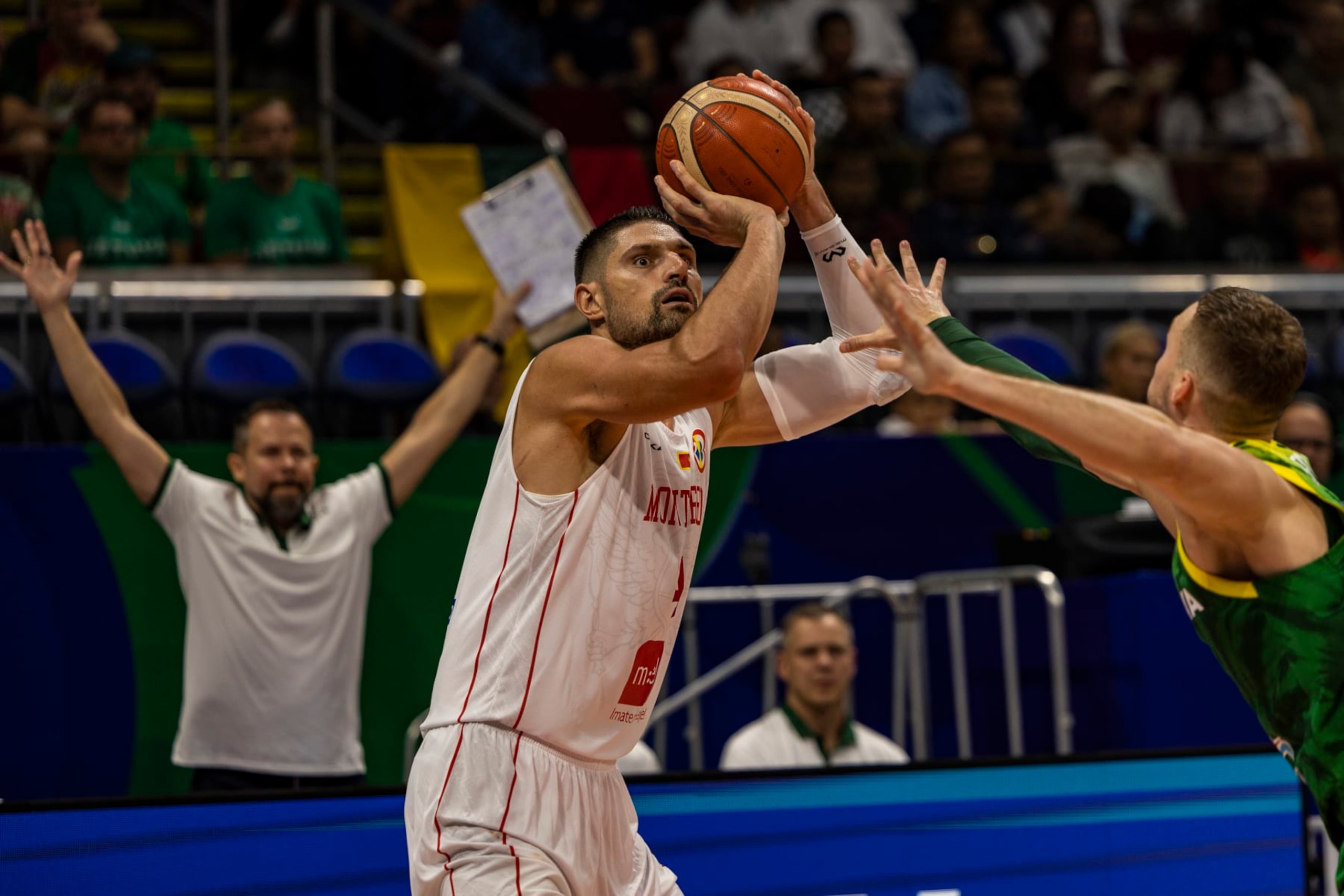 MANILA, PHILIPPINES - AUGUST 29: Nikola Vucevic #4 of Montenegro shoots the ball during the FIBA Basketball World Cup Group D game between Montenegro and Lithuania at Mall of Asia Arena on August 29, 2023 in Pasay, Metro Manila, Philippines. (Photo by Ezra Acayan/Getty Images)