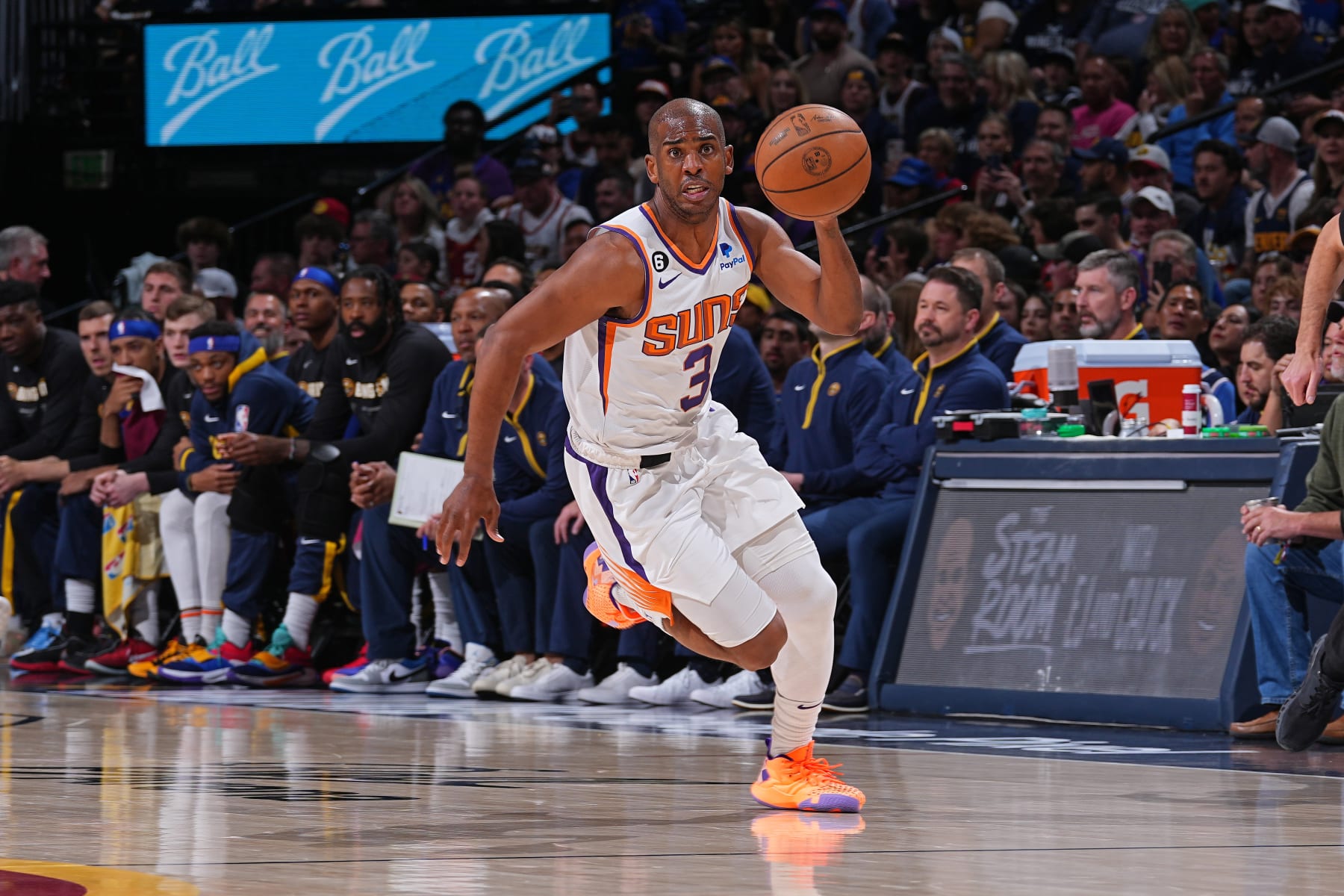 DENVER, CO - APRIL 29:  Chris Paul #3 of the Phoenix Suns dribbles the ball against the Denver Nuggets during Game One of the Western Conference Semi-Finals of the 2023 NBA Playoffs on April 29, 2023 at the Ball Arena in Denver, Colorado. NOTE TO USER: User expressly acknowledges and agrees that, by downloading and/or using this Photograph, user is consenting to the terms and conditions of the Getty Images License Agreement. Mandatory Copyright Notice: Copyright 2023 NBAE (Photo by Bart Young/NBAE via Getty Images)