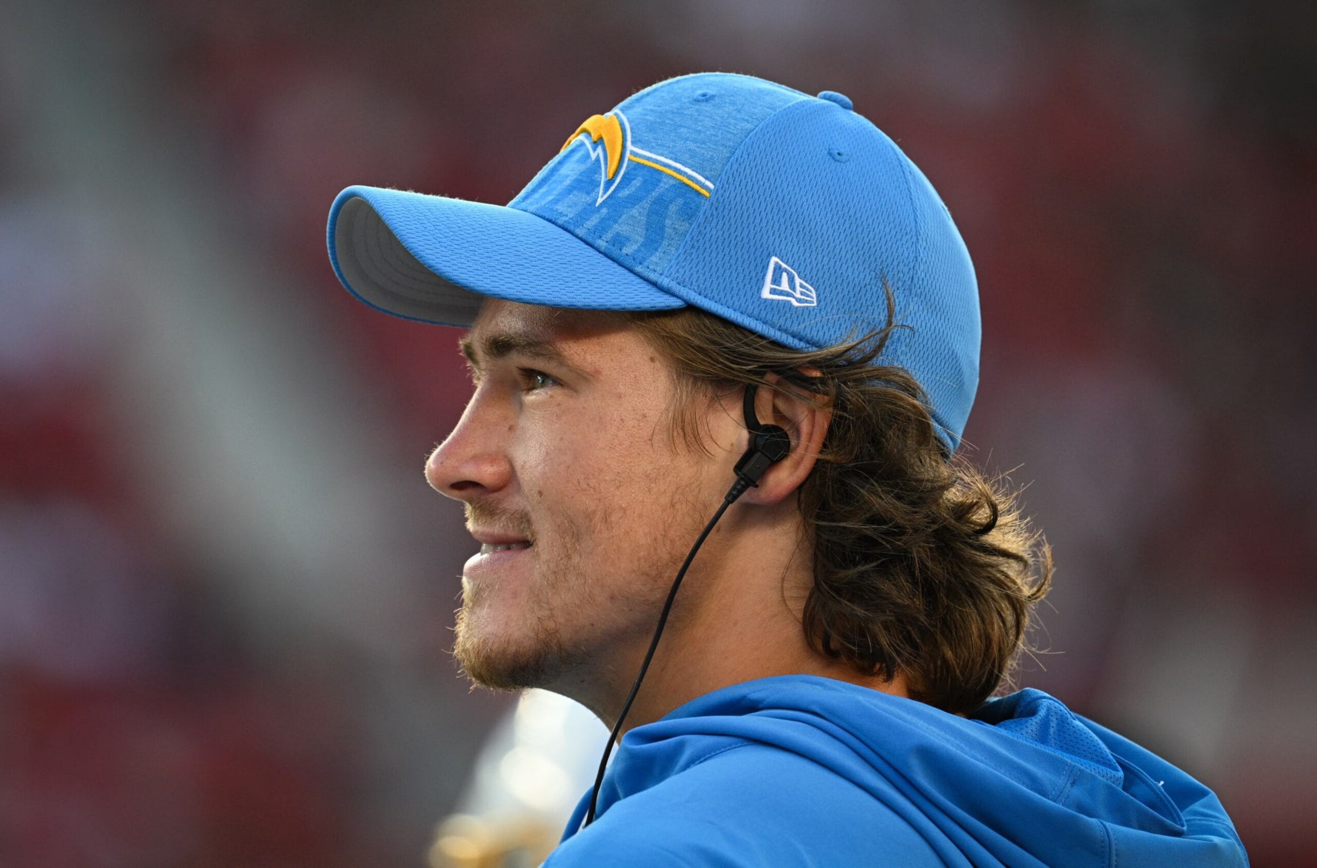 SANTA CLARA, CALIFORNIA - AUGUST 25: Justin Herbert #10 of the Los Angeles Chargers looks on from the sideline during the first half of a preseason game against the San Francisco 49ers at Levi's Stadium on August 25, 2023 in Santa Clara, California. (Photo by Loren Elliott/Getty Images)