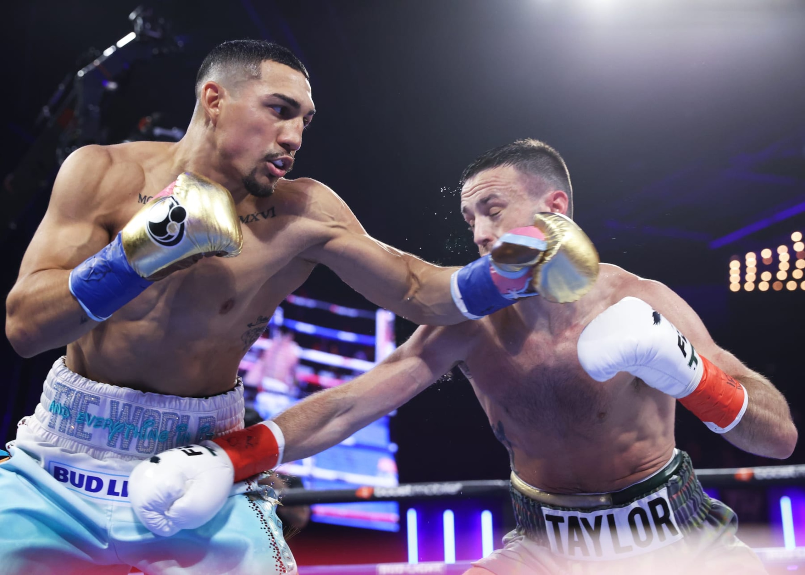 NEW YORK, NEW YORK - JUNE 10: Teofimo Lopez (L) and Josh Taylor (R) exchange punches during their WBO junior welterweight championship fight at The Hulu Theater at Madison Square Garden on June 10, 2023 in New York City. (Photo by Mikey Williams/Top Rank Inc via Getty Images)