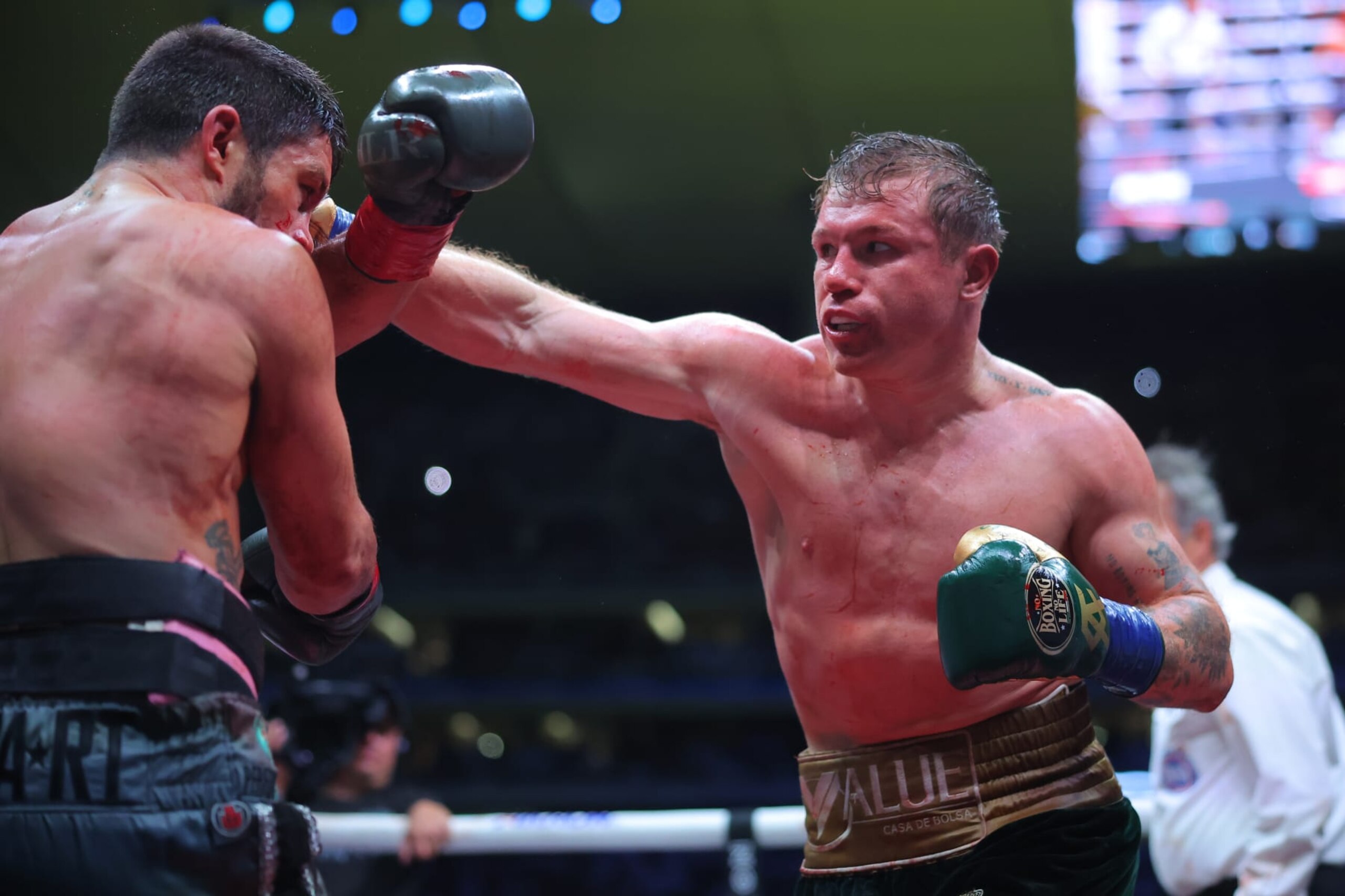 ZAPOPAN, MEXICO - MAY 06: Canelo Alvarez of Mexico punches John Ryder of Great Britain during the fight for the Super Middleweight Championship at Akron Stadium on May 06, 2023 in Zapopan, Mexico. (Photo by Hector Vivas/Getty Images)