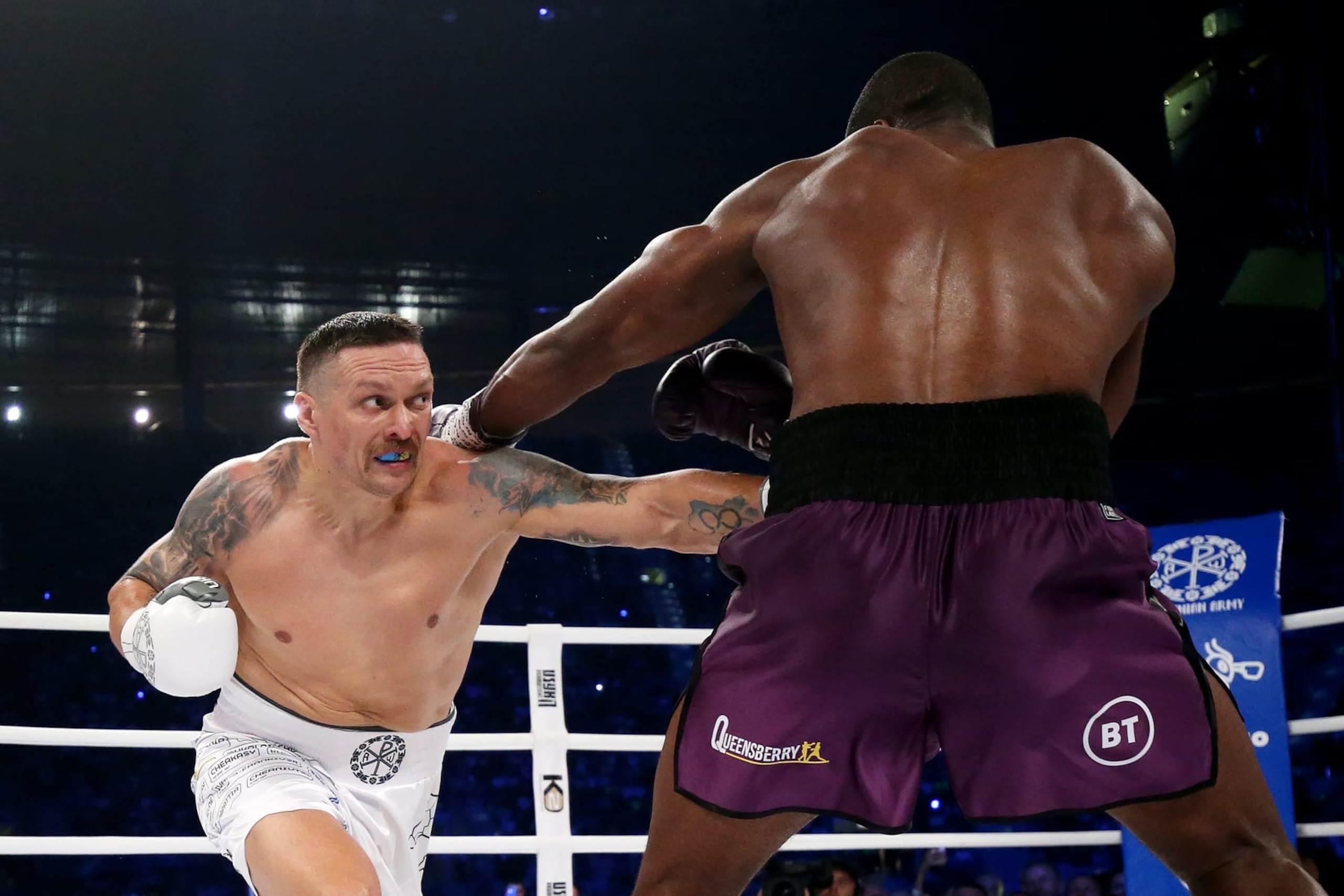 WROCLAW, POLAND - AUGUST 26: Oleksandr Usyk punches Daniel Dubois during the Heavyweight fight between Oleksandr Usyk and Daniel Dubois at Stadion Wroclaw on August 26, 2023 in Wroclaw, Poland. (Photo by Gabriel Kuchta/Getty Images)