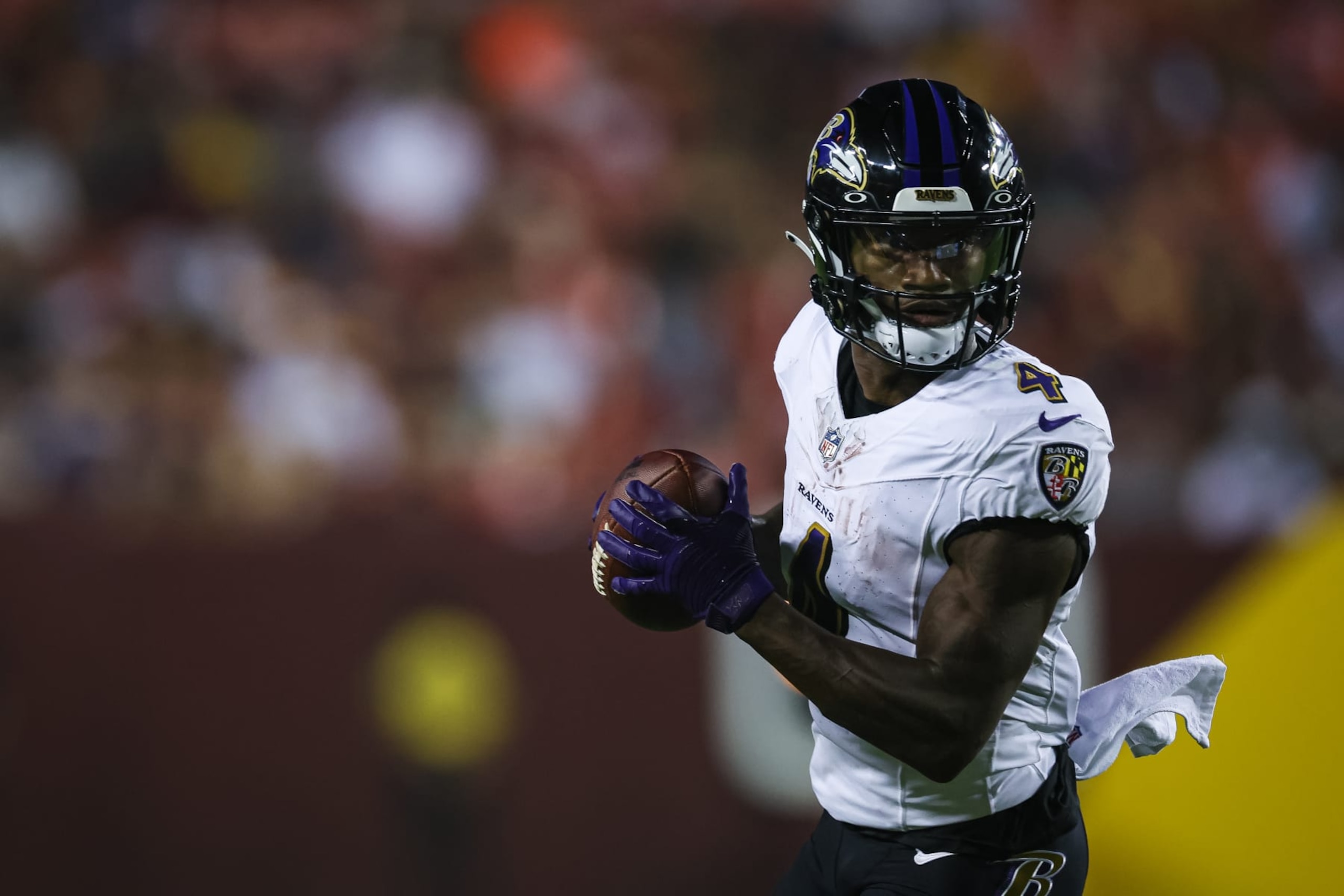 LANDOVER, MD - AUGUST 21: Zay Flowers #4 of the Baltimore Ravens catches a pass for a touchdown against the Washington Commanders during the first half of the preseason game at FedExField on August 21, 2023 in Landover, Maryland. (Photo by Scott Taetsch/Getty Images) LANDOVER, MD - AUGUST 21: Zay Flowers #4 of the Baltimore Ravens catches a pass for a touchdown against the Washington Commanders during the first half of the preseason game at FedExField on August 21, 2023 in Landover, Maryland. (Photo by Scott Taetsch/Getty Images)