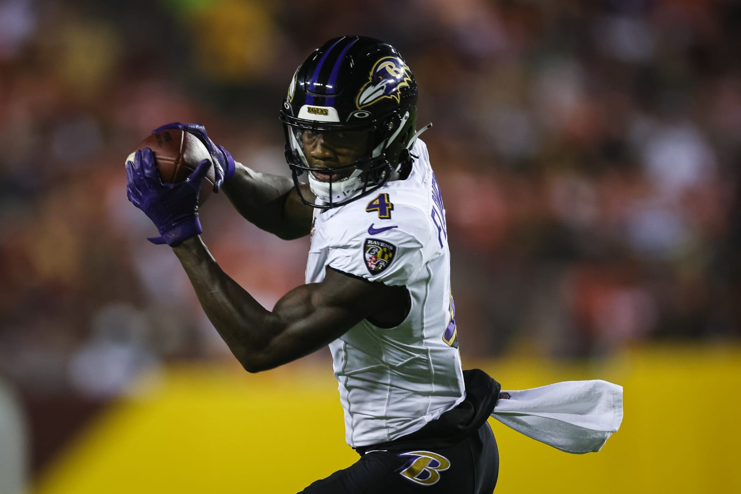 LANDOVER, MD - AUGUST 21: Zay Flowers #4 of the Baltimore Ravens catches a pass for a touchdown against the Washington Commanders during the first half of the preseason game at FedExField on August 21, 2023 in Landover, Maryland. (Photo by Scott Taetsch/Getty Images) LANDOVER, MD - AUGUST 21: Zay Flowers #4 of the Baltimore Ravens catches a pass for a touchdown against the Washington Commanders during the first half of the preseason game at FedExField on August 21, 2023 in Landover, Maryland. (Photo by Scott Taetsch/Getty Images)