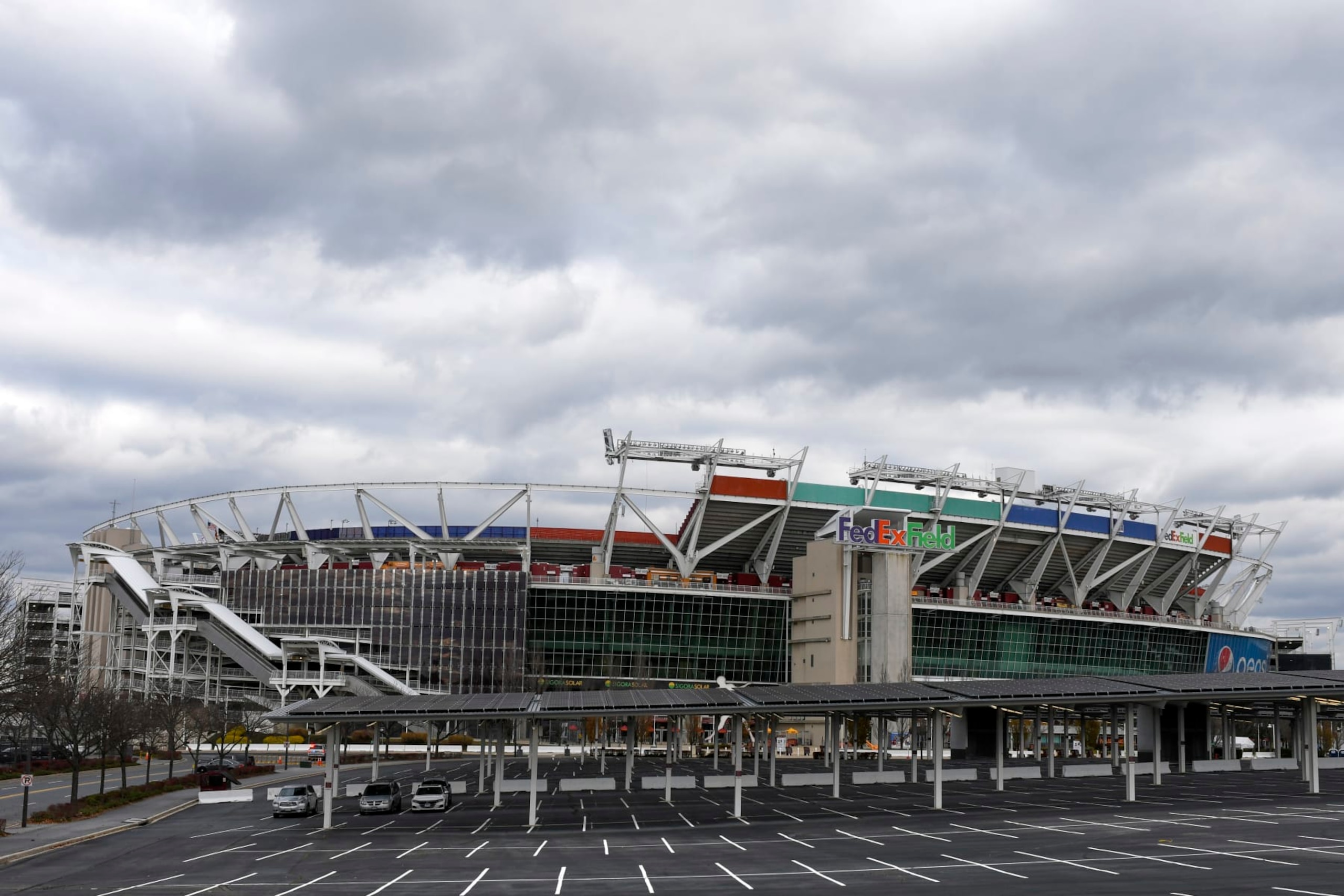FILE -FedEx Field is seen in this general view prior to an NFL football game between the Seattle Seahawks and the Washington Football Team, Monday, Nov. 29, 2021, in Landover, Md. A person with knowledge of the situation tells The Associated Press the Washington Commanders have bought land in Virginia for what could be a potential site of the NFL team’s next stadium. The 200 acres of land purchased for approximately $100 million is in Woodbridge roughly 25 miles outside the District of Columbia. The Commanders’ lease at FedEx Field in Landover, Maryland, expires in 2027. (AP Photo/Mark Tenally, File) FILE -FedEx Field is seen in this general view prior to an NFL football game between the Seattle Seahawks and the Washington Football Team, Monday, Nov. 29, 2021, in Landover, Md. A person with knowledge of the situation tells The Associated Press the Washington Commanders have bought land in Virginia for what could be a potential site of the NFL team’s next stadium. The 200 acres of land purchased for approximately $100 million is in Woodbridge roughly 25 miles outside the District of Columbia. The Commanders’ lease at FedEx Field in Landover, Maryland, expires in 2027. (AP Photo/Mark Tenally, File)