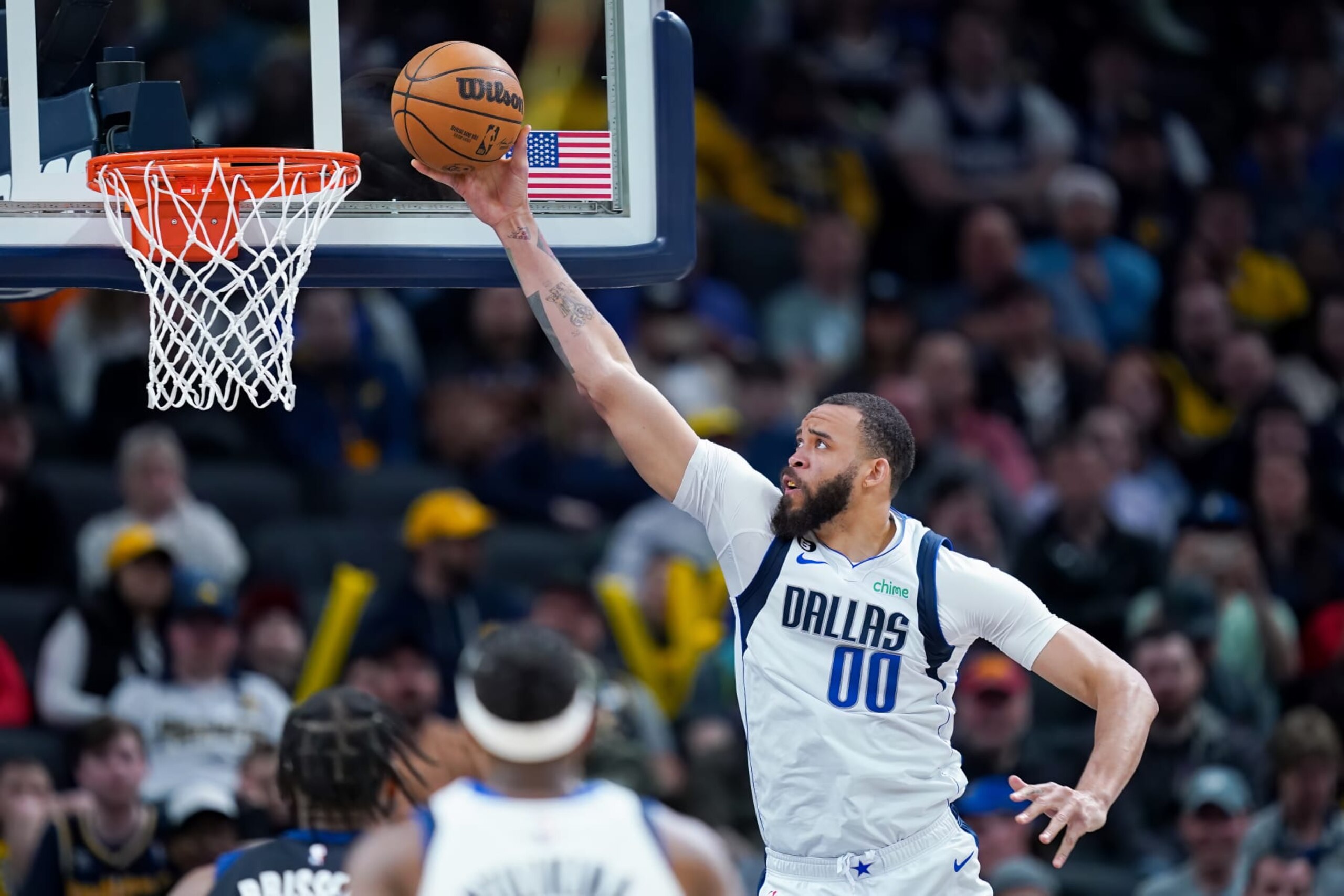 INDIANAPOLIS, INDIANA - MARCH 27: JaVale McGee #00 of the Dallas Mavericks attempts a layup in the fourth quarter against the Indiana Pacers at Gainbridge Fieldhouse on March 27, 2023 in Indianapolis, Indiana. NOTE TO USER: User expressly acknowledges and agrees that, by downloading and or using this photograph, User is consenting to the terms and conditions of the Getty Images License Agreement. (Photo by Dylan Buell/Getty Images)