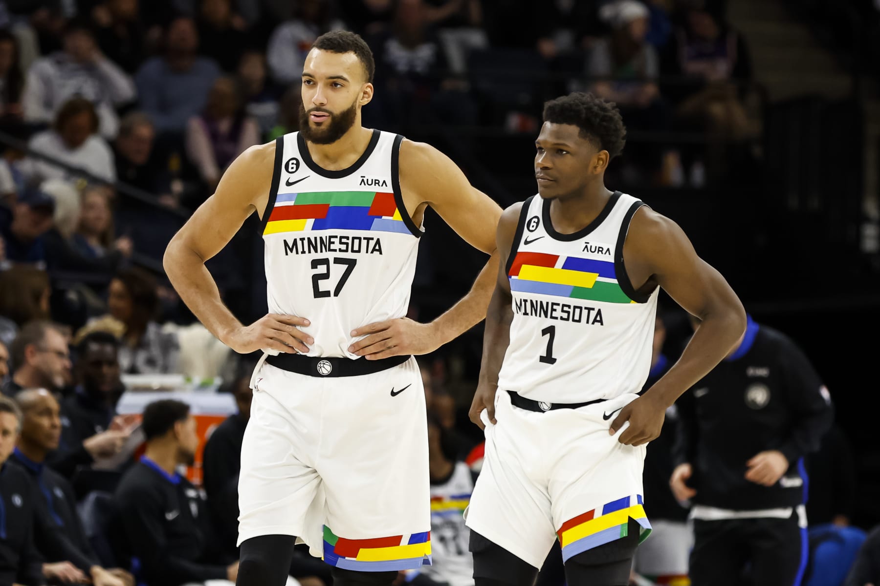 MINNEAPOLIS, MN - JANUARY 13: Rudy Gobert #27 and Anthony Edwards #1 of the Minnesota Timberwolves look on against the Phoenix Suns in the fourth quarter of the game at Target Center on January 13, 2022 in Minneapolis, Minnesota. The Timberwolves defeated the Suns 121-116. NOTE TO USER: User expressly acknowledges and agrees that, by downloading and or using this Photograph, user is consenting to the terms and conditions of the Getty Images License Agreement. (Photo by David Berding/Getty Images)