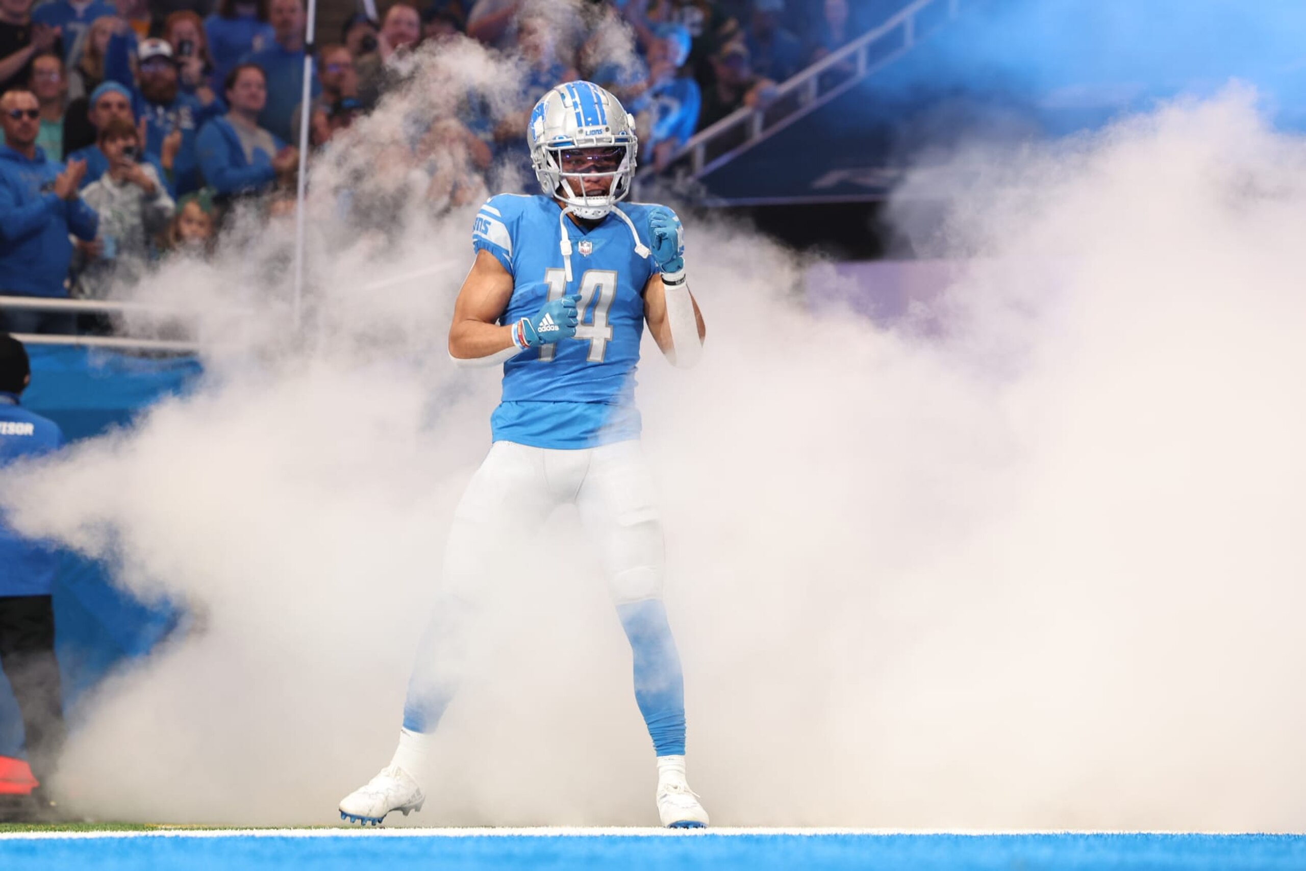 DETROIT, MICHIGAN - NOVEMBER 06: Amon-Ra St. Brown #14 of the Detroit Lions takes the field prior to a game against the Green Bay Packers at Ford Field on November 06, 2022 in Detroit, Michigan. (Photo by Rey Del Rio/Getty Images)