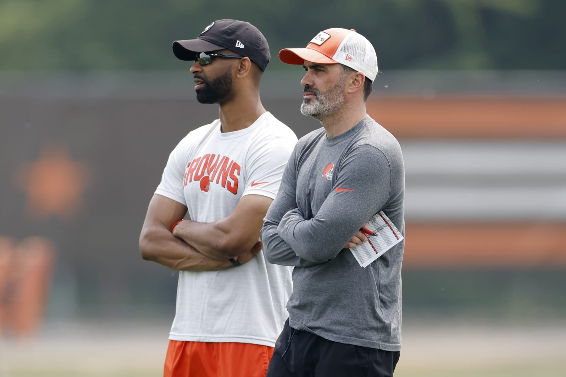 Cleveland Browns head coach Kevin Stefanski, right, stands with general manager Andrew Berry during drills at the NFL football team's practice facility Tuesday, June 6, 2023, in Berea, Ohio. (AP Photo/Ron Schwane)