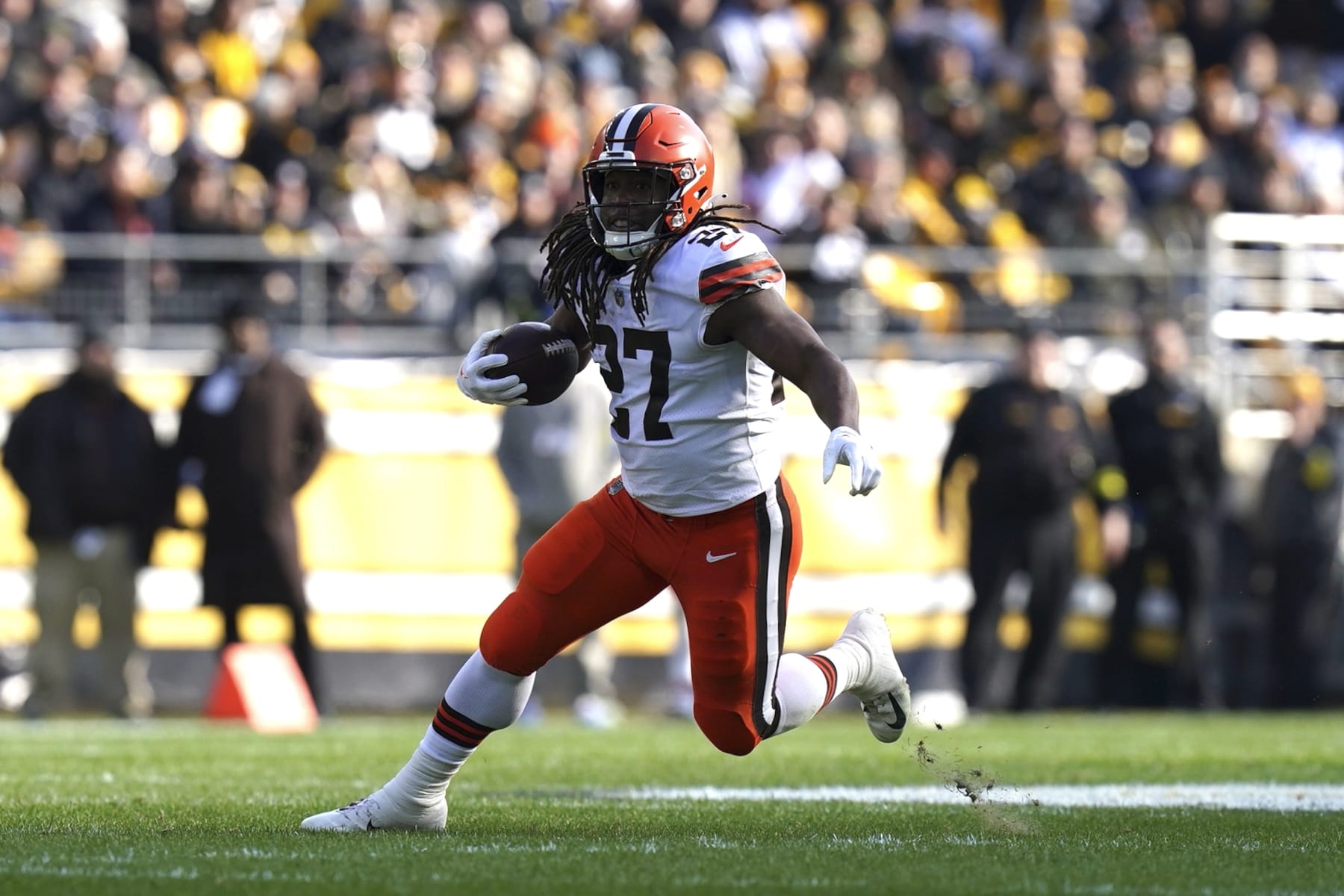 Cleveland Browns running back Kareem Hunt (27) carries during the second half of an NFL football game, Sunday, Jan. 8, 2023, in Pittsburgh. (AP Photo/Matt Freed)