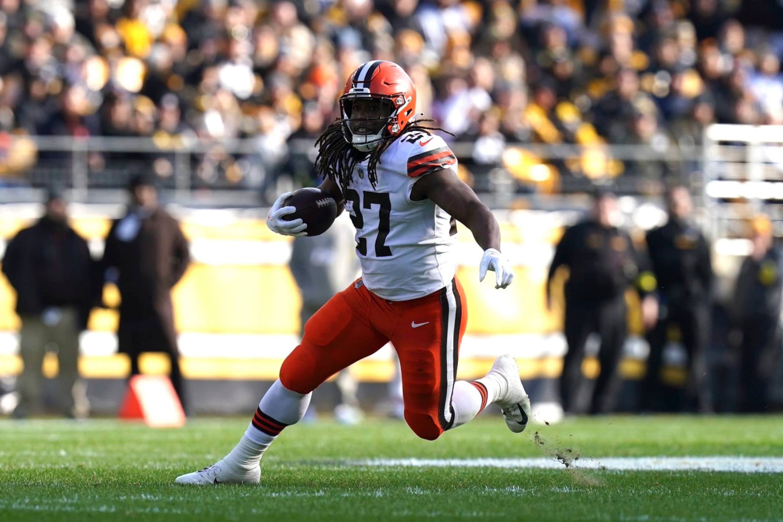 Cleveland Browns running back Kareem Hunt (27) carries during the second half of an NFL football game, Sunday, Jan. 8, 2023, in Pittsburgh. (AP Photo/Matt Freed)
