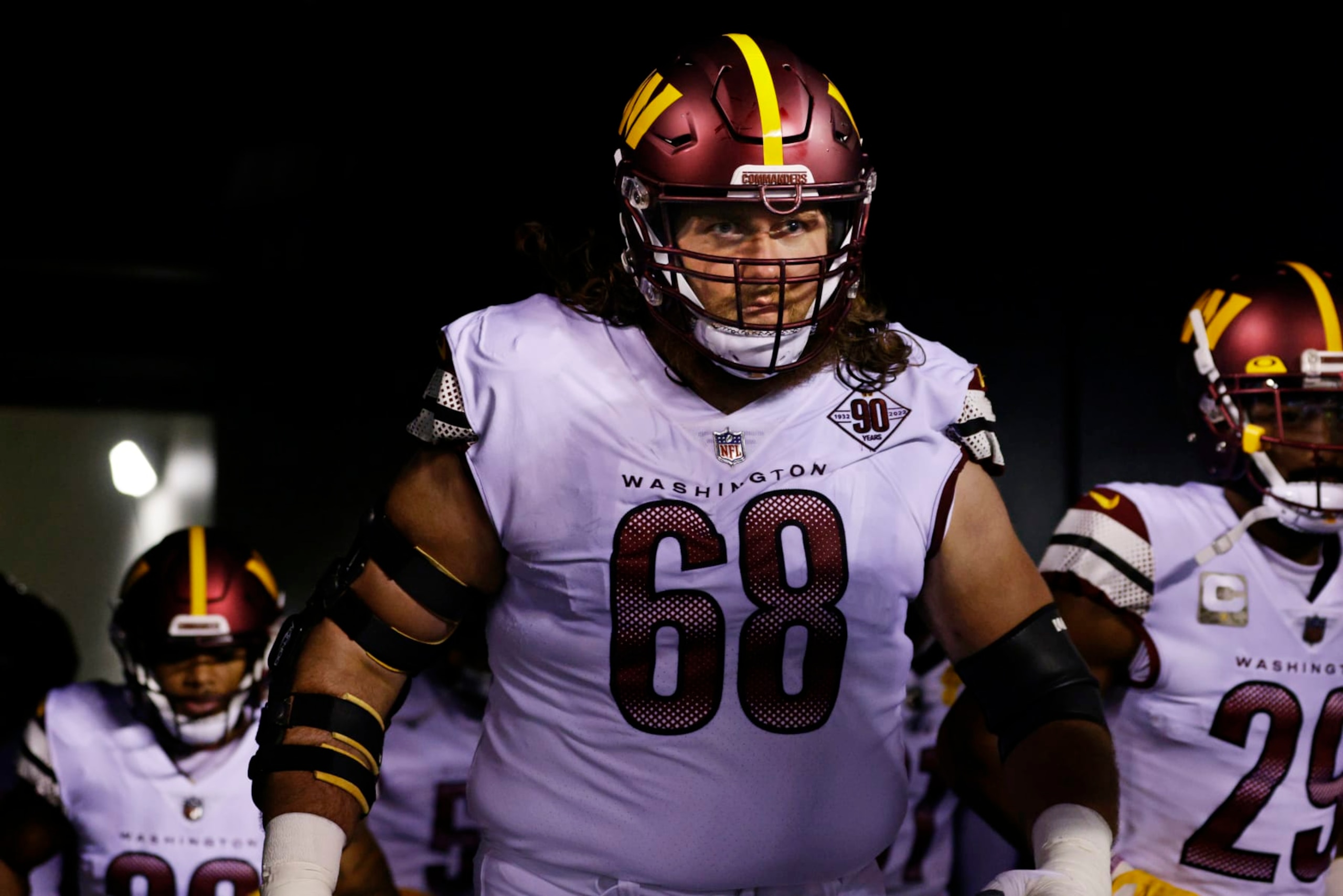 Washington Commanders guard Andrew Norwell (68) walks onto the field before an NFL football game against the Philadelphia Eagles, Monday, Nov. 14, 2022, in Philadelphia. (AP Photo/Rich Schultz)