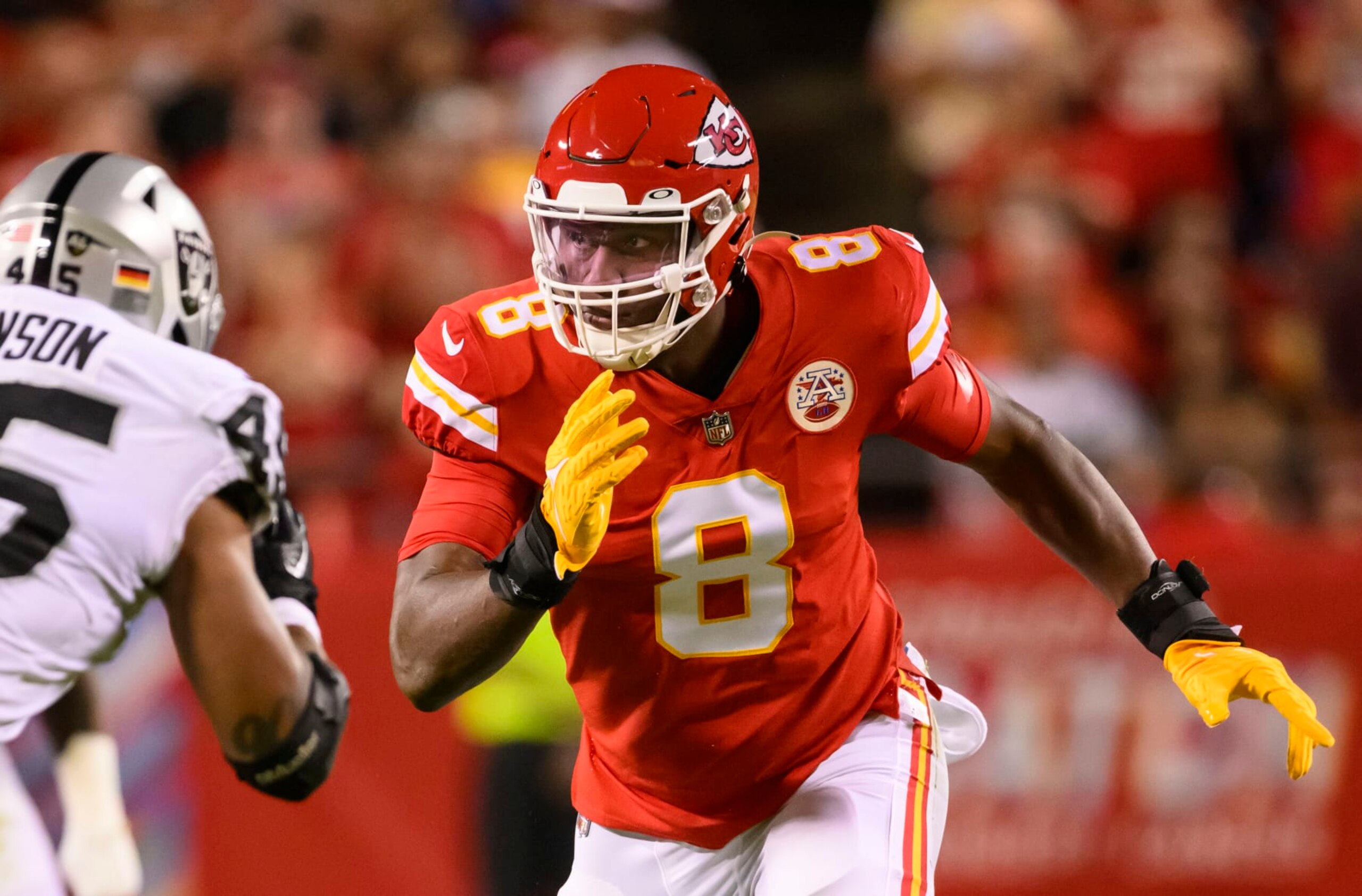FILE - Kansas City Chiefs defensive end Carlos Dunlap rushes against Las Vegas Raiders fullback Jakob Johnson (45) during the first half of an NFL football game, Monday, Oct. 10, 2022 in Kansas City, Mo. Dunlap signed with the Chiefs because he was tired of losing: six times in the playoffs without a win. Now, he might book-end his first playoff victory with one in the Super Bowl. (AP Photo/Reed Hoffmann, File) FILE - Kansas City Chiefs defensive end Carlos Dunlap rushes against Las Vegas Raiders fullback Jakob Johnson (45) during the first half of an NFL football game, Monday, Oct. 10, 2022 in Kansas City, Mo. Dunlap signed with the Chiefs because he was tired of losing: six times in the playoffs without a win. Now, he might book-end his first playoff victory with one in the Super Bowl. (AP Photo/Reed Hoffmann, File)
