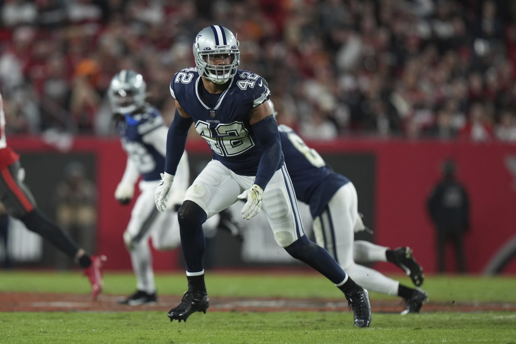 Dallas Cowboys linebacker Anthony Barr (42) defends just beyond the line of scrimmage as he shadows the movements of the passer during an NFL wild-card football game against the Tampa Bay Buccaneers, Monday, Jan. 16, 2023, in Tampa, Fla. (AP Photo/Peter Joneleit)