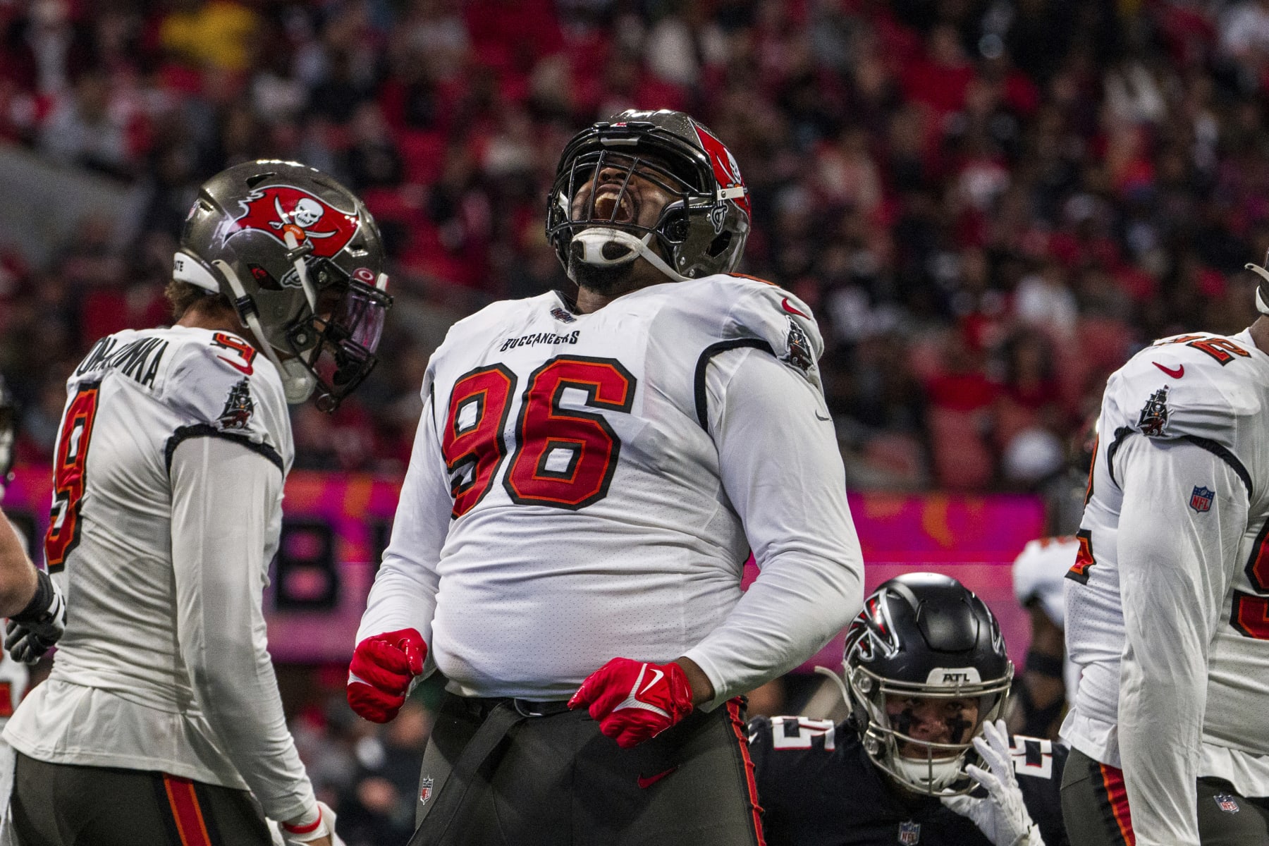 Tampa Bay Buccaneers defensive end Akiem Hicks (96) celebrates during the first half of an NFL football game against the Atlanta Falcons, Sunday, Jan. 8, 2023, in Atlanta. (AP Photo/Danny Karnik)