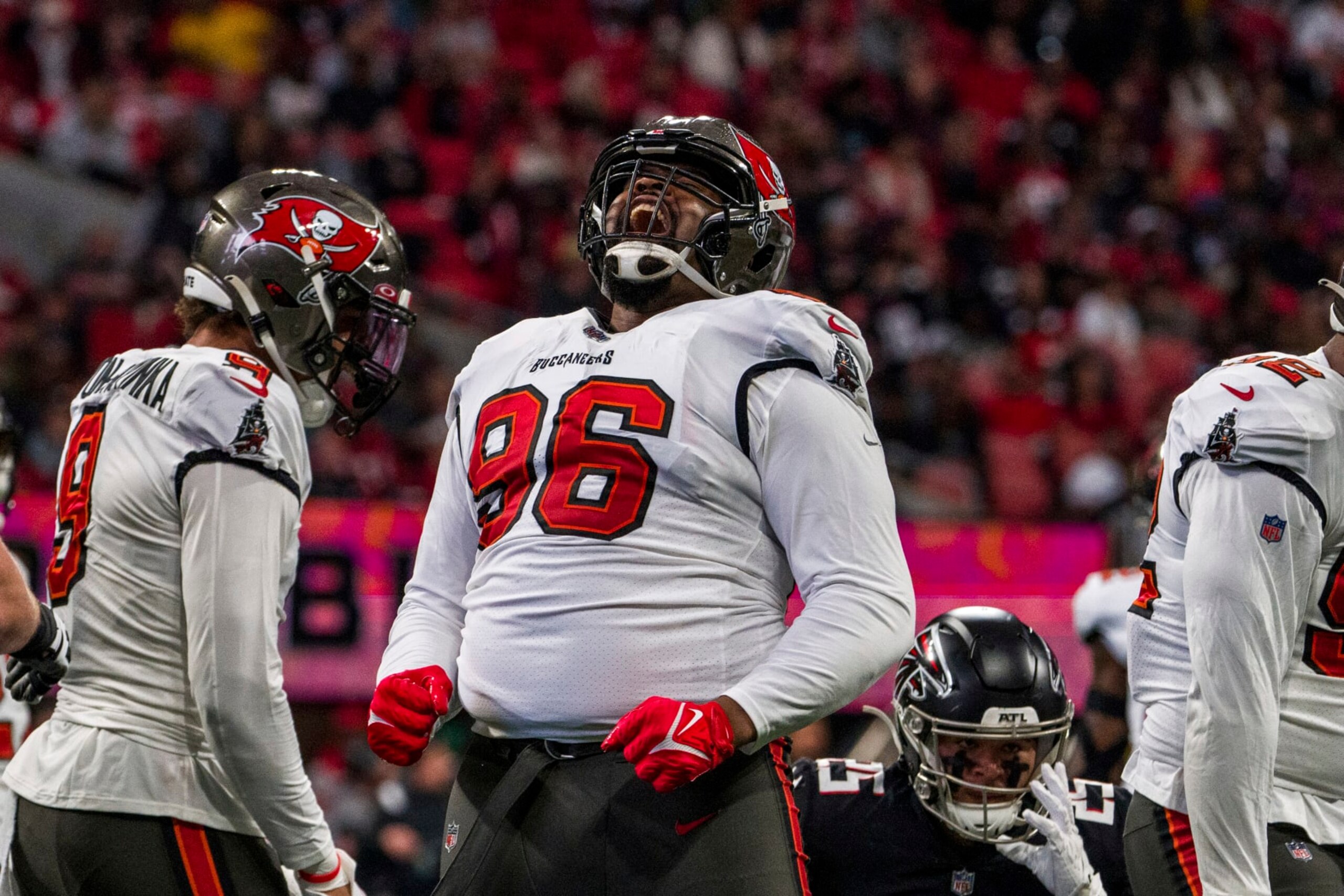 Tampa Bay Buccaneers defensive end Akiem Hicks (96) celebrates during the first half of an NFL football game against the Atlanta Falcons, Sunday, Jan. 8, 2023, in Atlanta. (AP Photo/Danny Karnik)