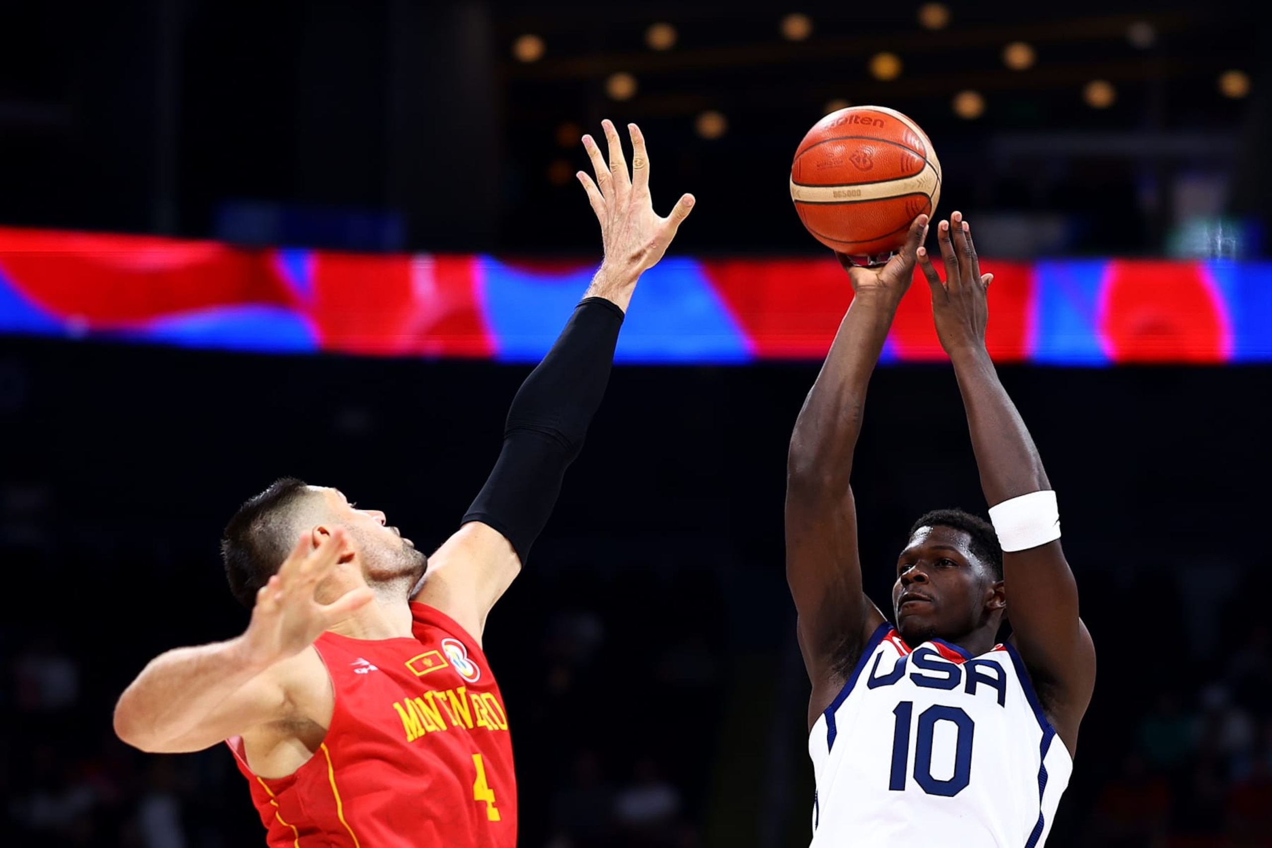 MANILA, PHILIPPINES - SEPTEMBER 01: Anthony Edwards #10 of the United States attempts a three-pointer against Nikola Vucevic #4 of Montenegro in the third quarter during the FIBA Basketball World Cup 2nd Round Group J game at Mall of Asia Arena on September 01, 2023 in Manila, Philippines. (Photo by Yong Teck Lim/Getty Images) MANILA, PHILIPPINES - SEPTEMBER 01: Anthony Edwards #10 of the United States attempts a three-pointer against Nikola Vucevic #4 of Montenegro in the third quarter during the FIBA Basketball World Cup 2nd Round Group J game at Mall of Asia Arena on September 01, 2023 in Manila, Philippines. (Photo by Yong Teck Lim/Getty Images)