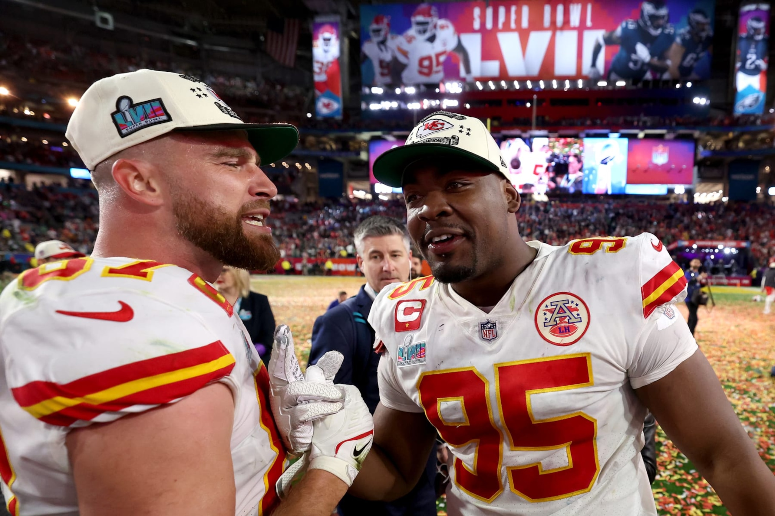 GLENDALE, ARIZONA - FEBRUARY 12: Travis Kelce #87 and Chris Jones #95 of the Kansas City Chiefs celebrate after defeating the Philadelphia Eagles 38-35 in Super Bowl LVII at State Farm Stadium on February 12, 2023 in Glendale, Arizona. (Photo by Gregory Shamus/Getty Images)