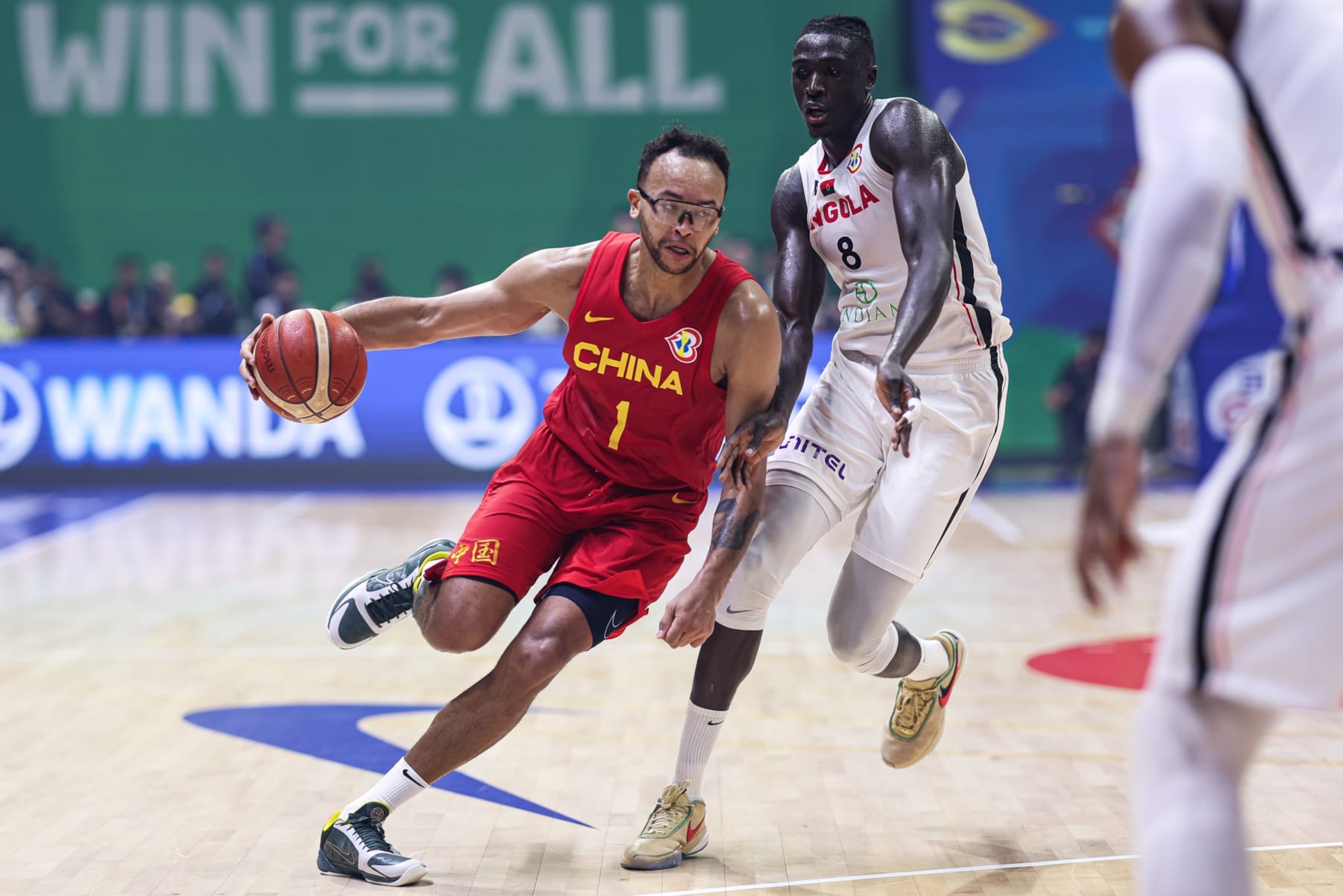 MANILA, PHILIPPINES - AUGUST 31: Kyle Anderson #1 of China drives the ball against Jilson Bango #8 of Angola during the Classification Round 17-32 Group M match between Angola and China on day 7 of the FIBA Basketball World Cup at Araneta Coliseum on August 31, 2023 in Manila, Philippines. (Photo by Liu Lu/VCG via Getty Images)