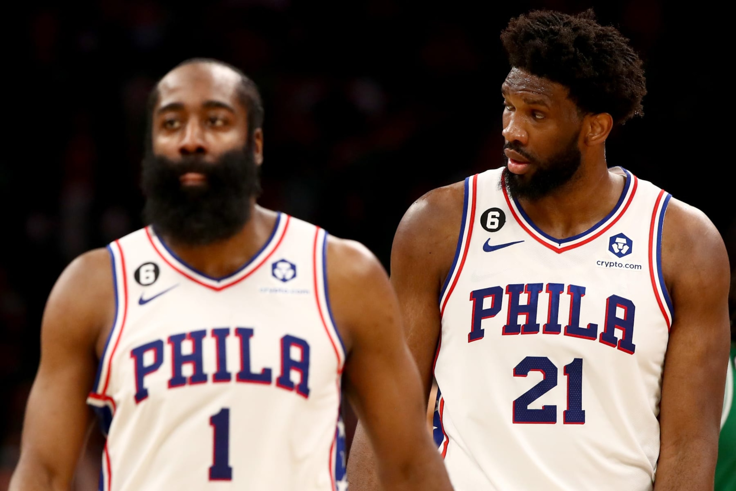 BOSTON, MASSACHUSETTS - MAY 14: James Harden #1 and Joel Embiid #21 of the Philadelphia 76ers reacts against the Boston Celtics during the third quarter in game seven of the 2023 NBA Playoffs Eastern Conference Semifinals at TD Garden on May 14, 2023 in Boston, Massachusetts. NOTE TO USER: User expressly acknowledges and agrees that, by downloading and or using this photograph, User is consenting to the terms and conditions of the Getty Images License Agreement. (Photo by Adam Glanzman/Getty Images)