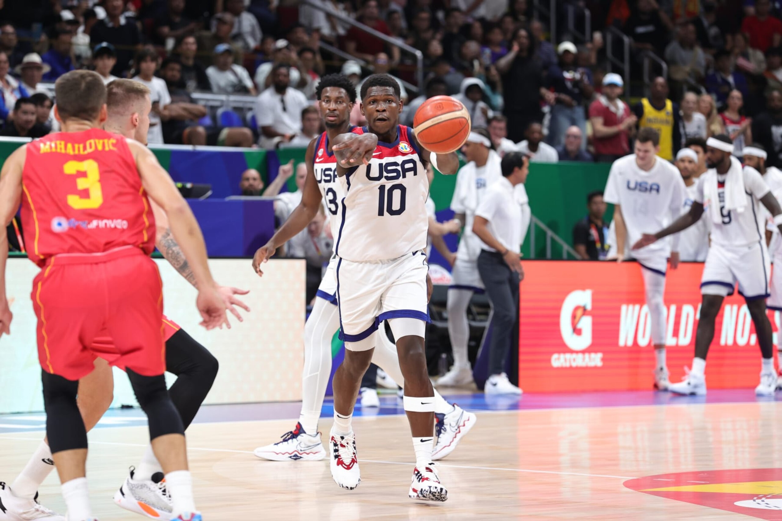 MANILA, PHILIPPINES - SEPTEMBER 1: Anthony Edwards #10 of the USA Men's Senior National Team passes against Montenegro in the second round as part of the 2023 FIBA World Cup on September 1, 2023 at Mall of Asia Arena in Manila, Philippines. NOTE TO USER: User expressly acknowledges and agrees that, by downloading and/or using this photograph, user is consenting to the terms and conditions of the Getty Images License Agreement. Mandatory Copyright Notice: Copyright 2023 NBAE (Photo by Nathaniel S. Butler/NBAE via Getty Images)