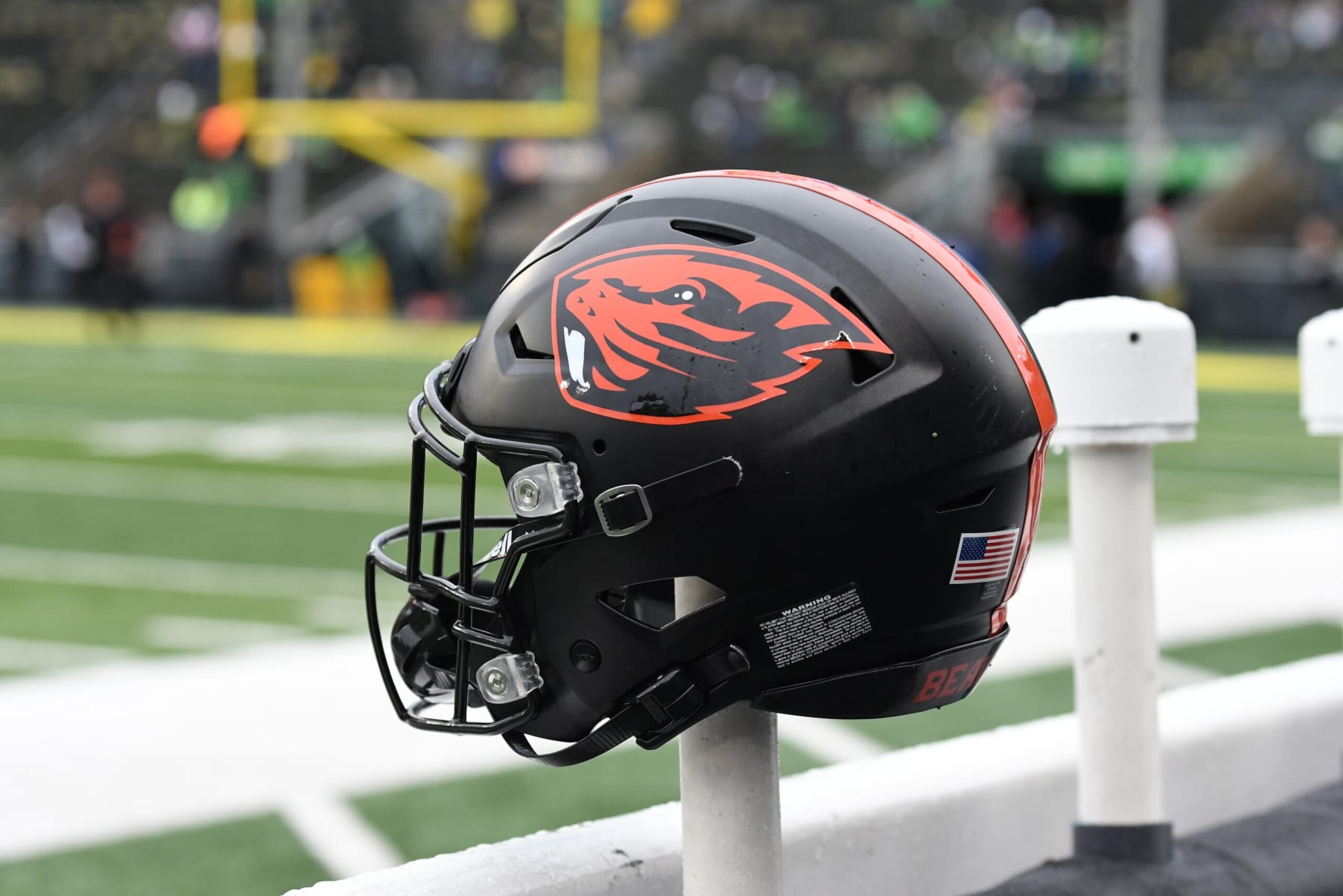 EUGENE, OR - NOVEMBER 27: An Oregon State helmet sits on the back of a bench during a PAC-12 conference football game between the Oregon State Beavers and Oregon Ducks on November 27, 2021 at Autzen Stadium in Eugene, Oregon. (Photo by Brian Murphy/Icon Sportswire via Getty Images)