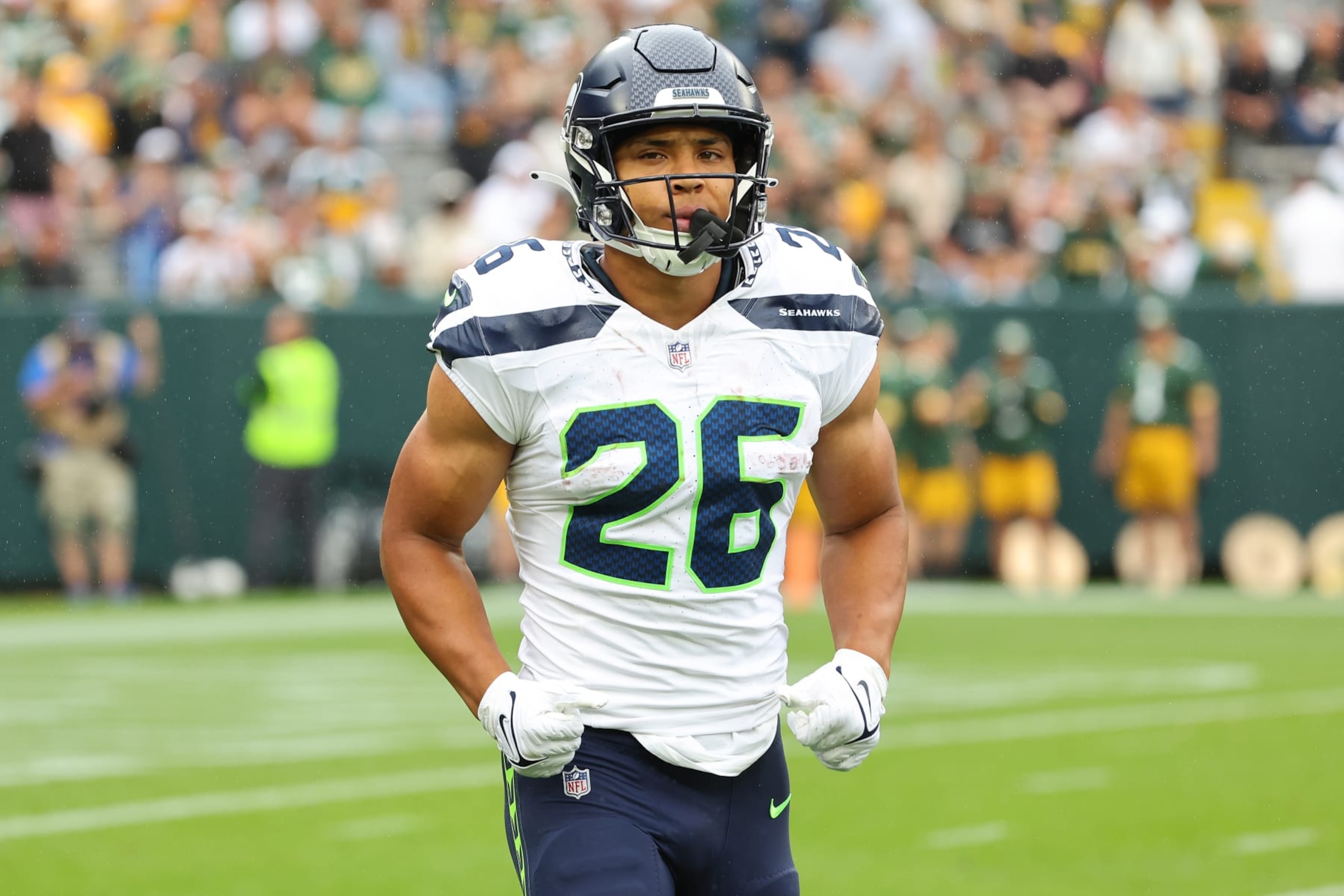 GREEN BAY, WISCONSIN - AUGUST 26: Zach Charbonnet #26 of the Seattle Seahawks takes the field prior to a preseason game against the Green Bay Packers at Lambeau Field on August 26, 2023 in Green Bay, Wisconsin. (Photo by Stacy Revere/Getty Images)