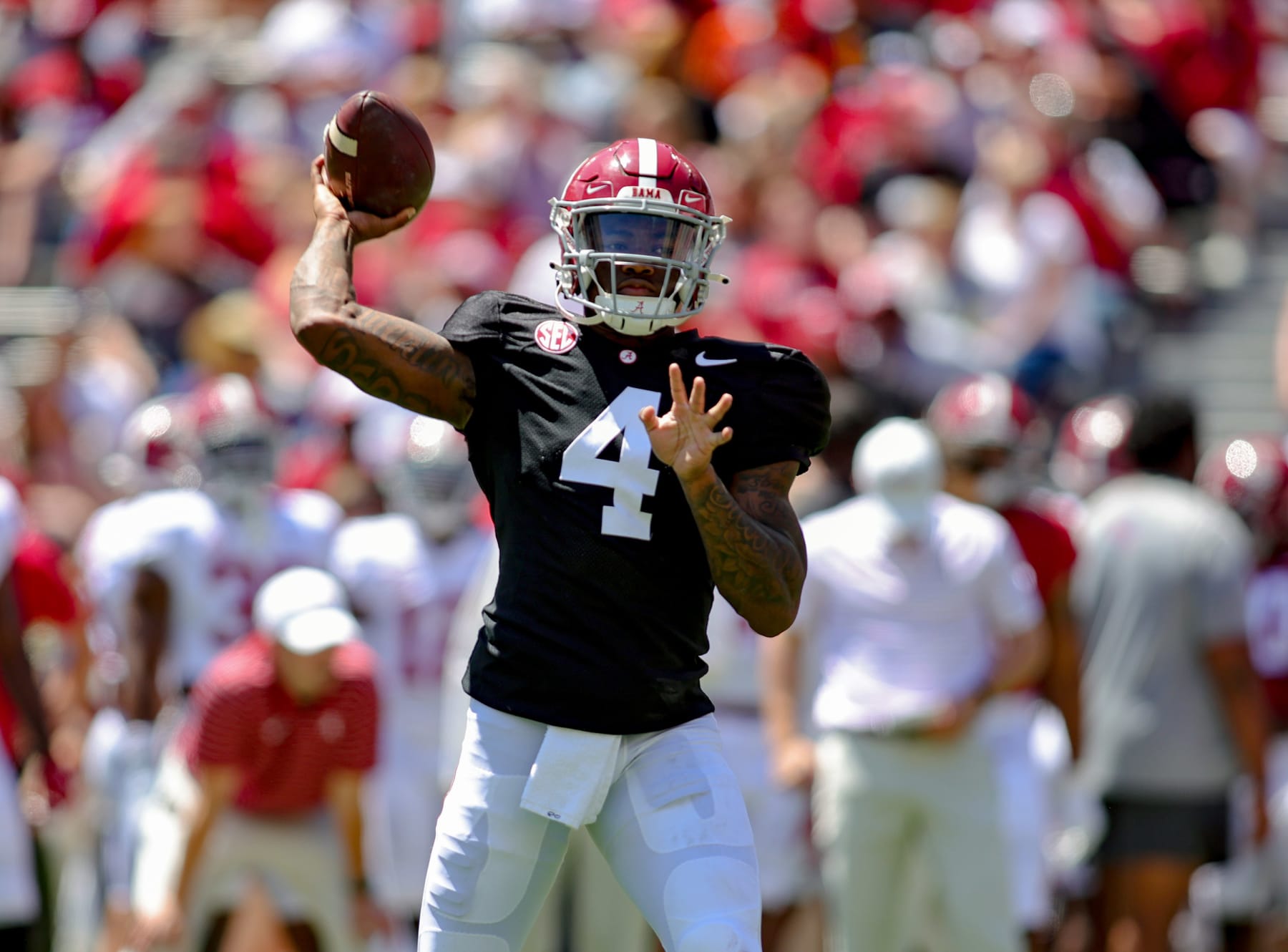 TUSCALOOSA, ALABAMA - APRIL 22: Jalen Milroe #4 of the White Team throws during the first half of the Alabama Spring Football Game at Bryant-Denny Stadium on April 22, 2023 in Tuscaloosa, Alabama. (Photo by Brandon Sumrall/Getty Images)