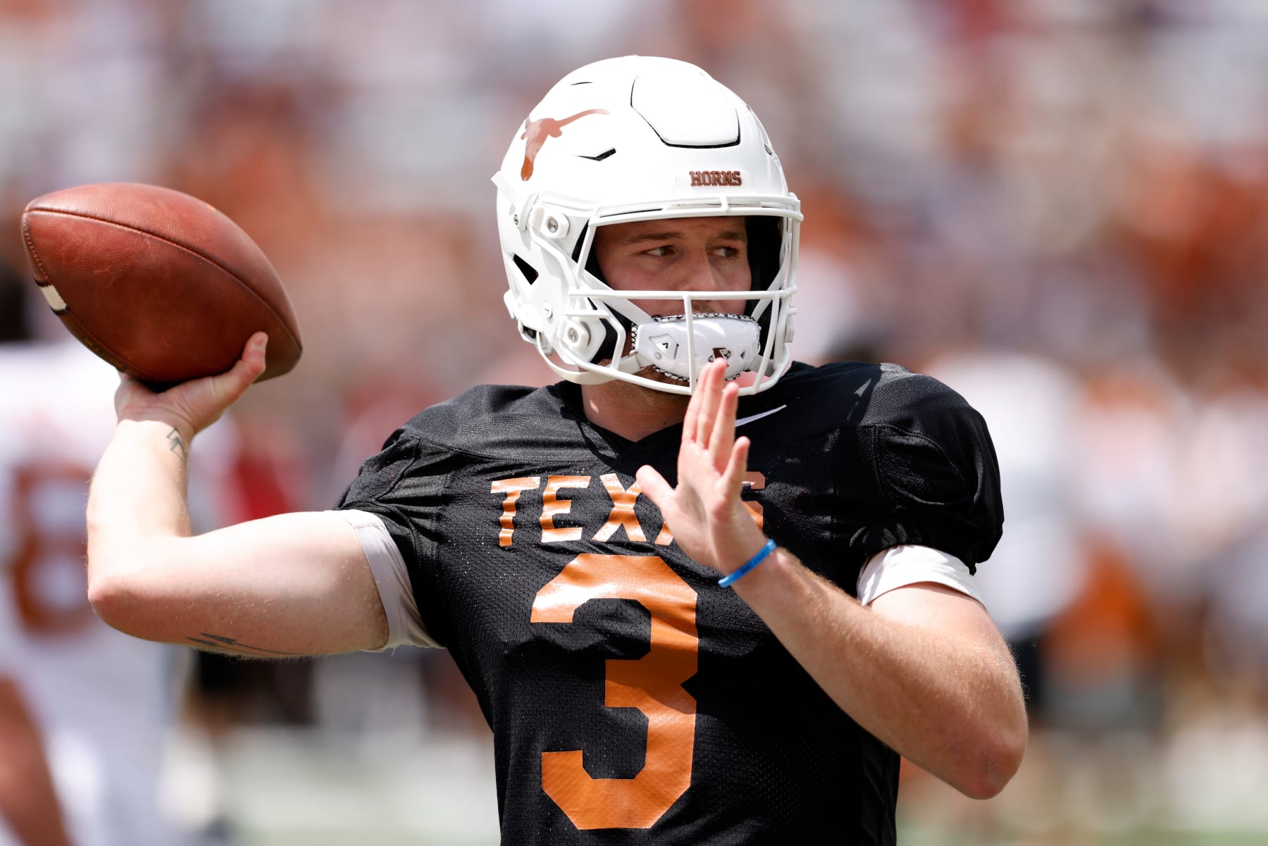 AUSTIN, TEXAS - APRIL 15: Quinn Ewers #3 of the Texas Longhorns warms up before the Texas Football Orange-White Spring Football Game at Darrell K Royal-Texas Memorial Stadium on April 15, 2023 in Austin, Texas. (Photo by Tim Warner/Getty Images)