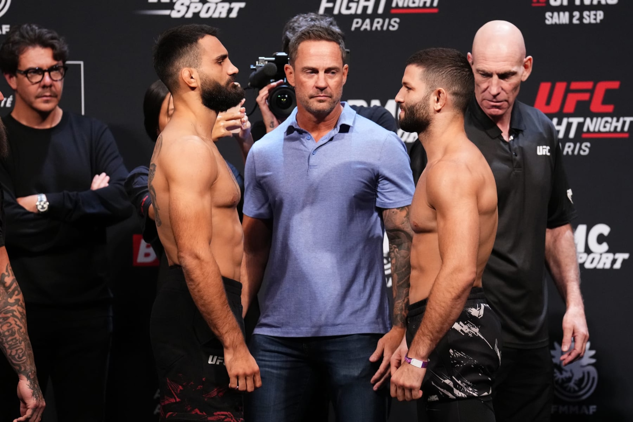 PARIS, FRANCE - SEPTEMBER 01: (L-R) Benoit Saint Denis of France and Thiago Moises of Brazil face off during the UFC Fight Night ceremonial weigh-in at The Accor Arena on September 01, 2023 in Paris, France. (Photo by Josh Hedges/Zuffa LLC via Getty Images)