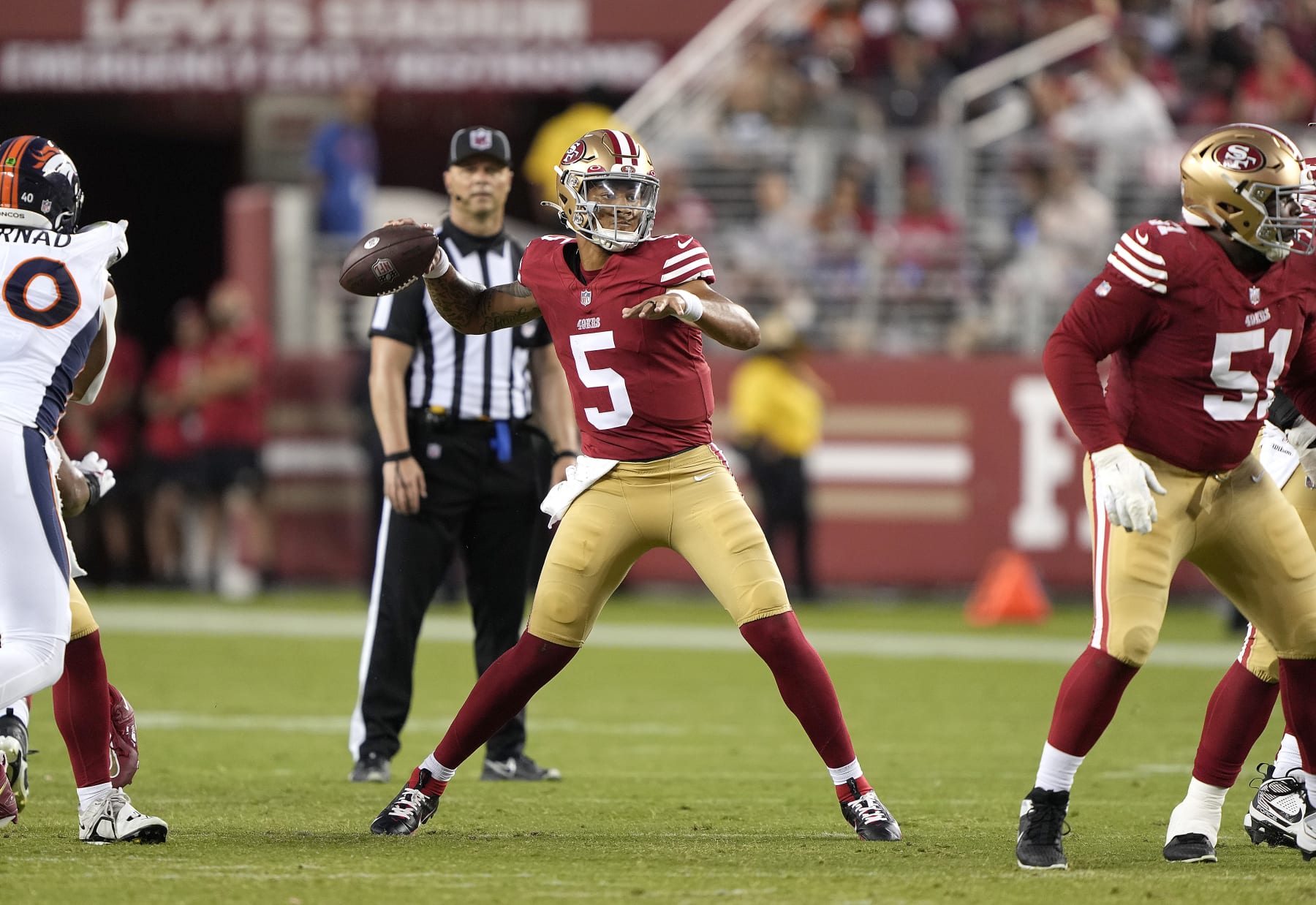SANTA CLARA, CALIFORNIA - AUGUST 19: Trey Lance #5 of the San Francisco 49ers looks to pass the ball against the Denver Broncos in the fourth quarter at Levi's Stadium on August 19, 2023 in Santa Clara, California. (Photo by Thearon W. Henderson/Getty Images)