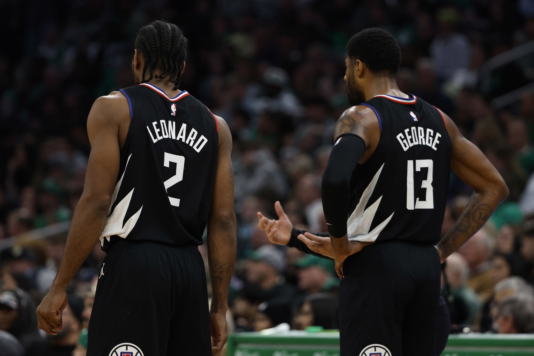 BOSTON, MA - DECEMBER 29: Kawhi Leonard #2 of the LA Clippers and Paul George #13 during the second quarter against the Boston Celtics at TD Garden on December 29, 2022 in Boston, Massachusetts. NOTE TO USER: User expressly acknowledges and agrees that, by downloading and/or using this Photograph, user is consenting to the terms and conditions of the Getty Images License Agreement. (Photo by Winslow Townson/Getty Images)