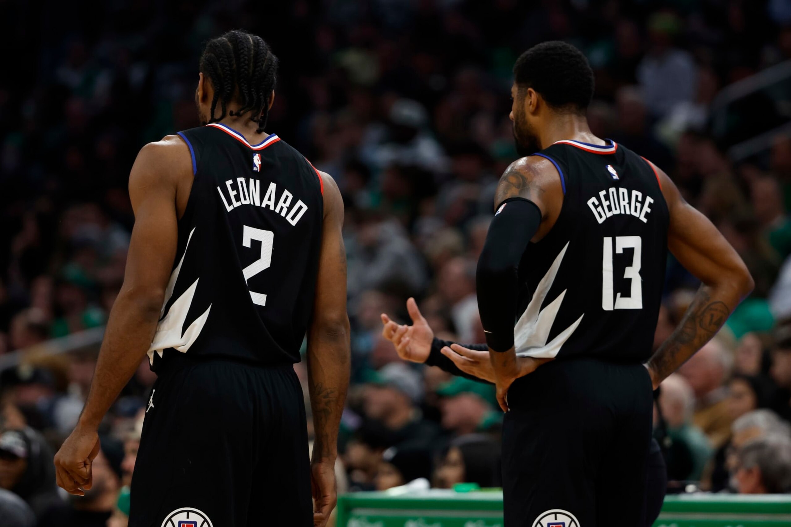 BOSTON, MA - DECEMBER 29: Kawhi Leonard #2 of the LA Clippers and Paul George #13 during the second quarter against the Boston Celtics at TD Garden on December 29, 2022 in Boston, Massachusetts. NOTE TO USER: User expressly acknowledges and agrees that, by downloading and/or using this Photograph, user is consenting to the terms and conditions of the Getty Images License Agreement. (Photo by Winslow Townson/Getty Images)