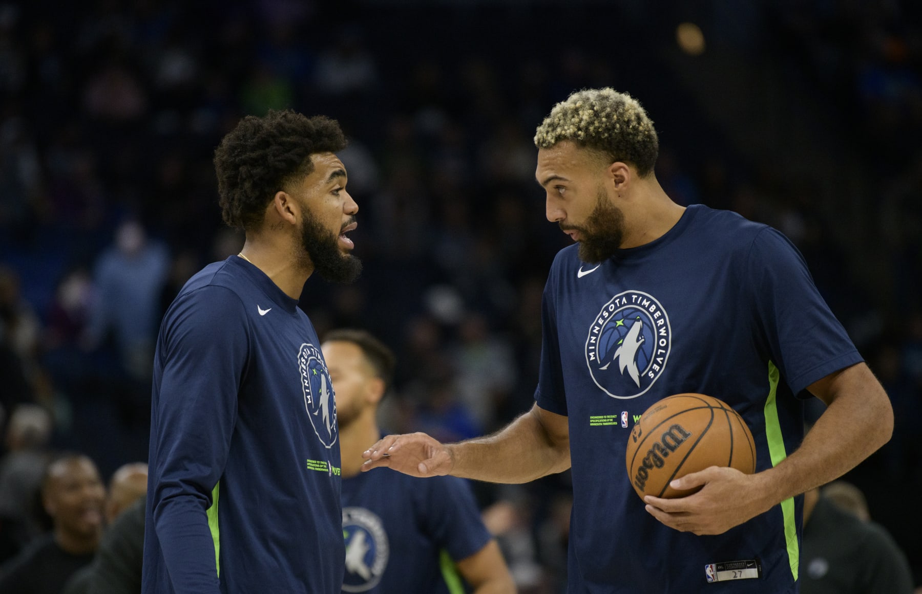 MINNEAPOLIS, MN - OCTOBER 21: Karl-Anthony Towns #32 of the Minnesota Timberwolves speaks with Rudy Gobert #27 before the game against the Utah Jazz at Target Center on October 21, 2022 in Minneapolis, Minnesota. NOTE TO USER: User expressly acknowledges and agrees that, by downloading and or using this photograph, User is consenting to the terms and conditions of the Getty Images License Agreement. (Photo by Stephen Maturen/Getty Images)