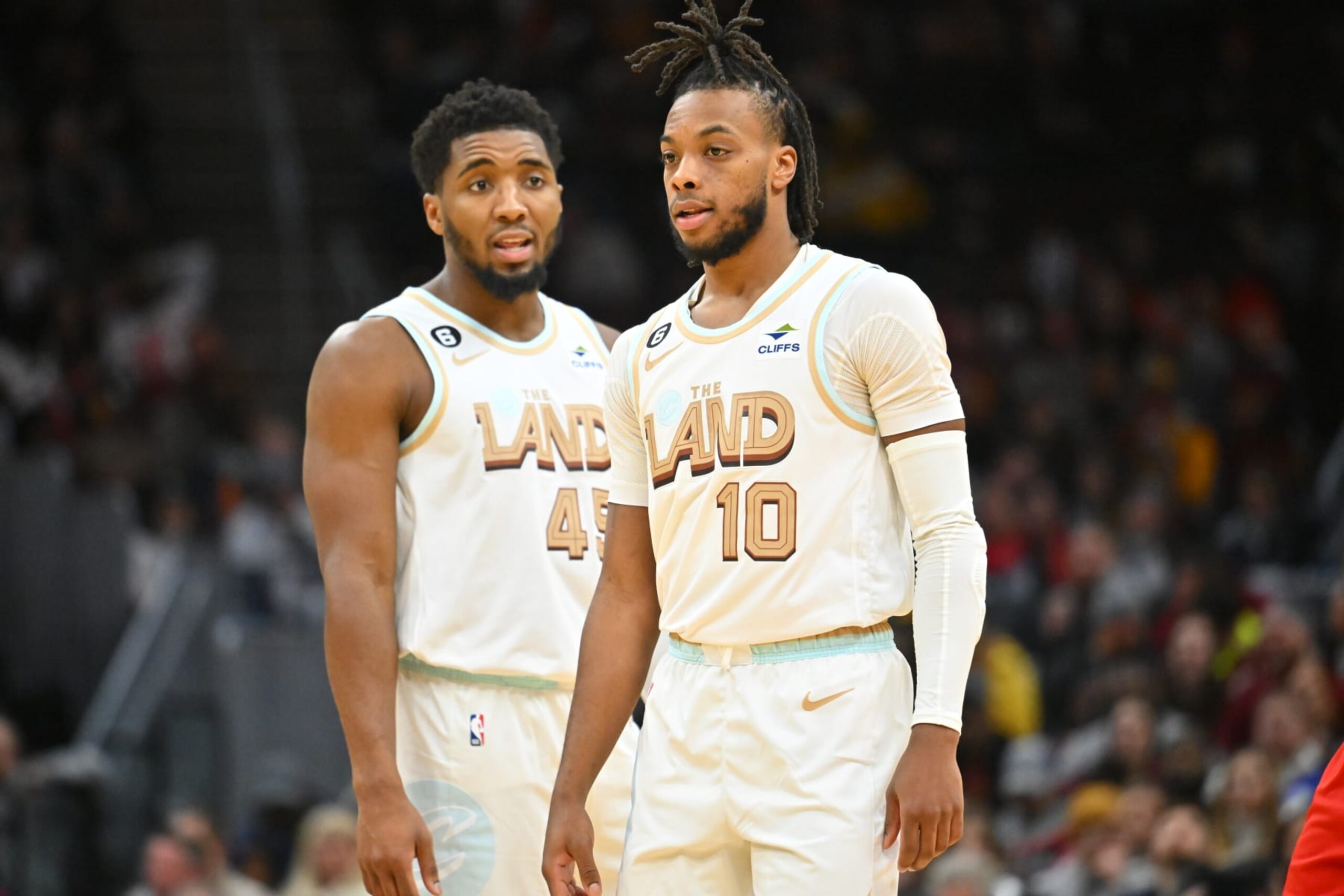 CLEVELAND, OHIO - DECEMBER 23: Darius Garland #10 and Donovan Mitchell #45 of the Cleveland Cavaliers talk during a free-throw against the Toronto Raptors during the fourth quarter at Rocket Mortgage Fieldhouse on December 23, 2022 in Cleveland, Ohio. The Raptors defeated the Cavaliers 118-107. NOTE TO USER: User expressly acknowledges and agrees that, by downloading and or using this photograph, User is consenting to the terms and conditions of the Getty Images License Agreement. (Photo by Jason Miller/Getty Images)
