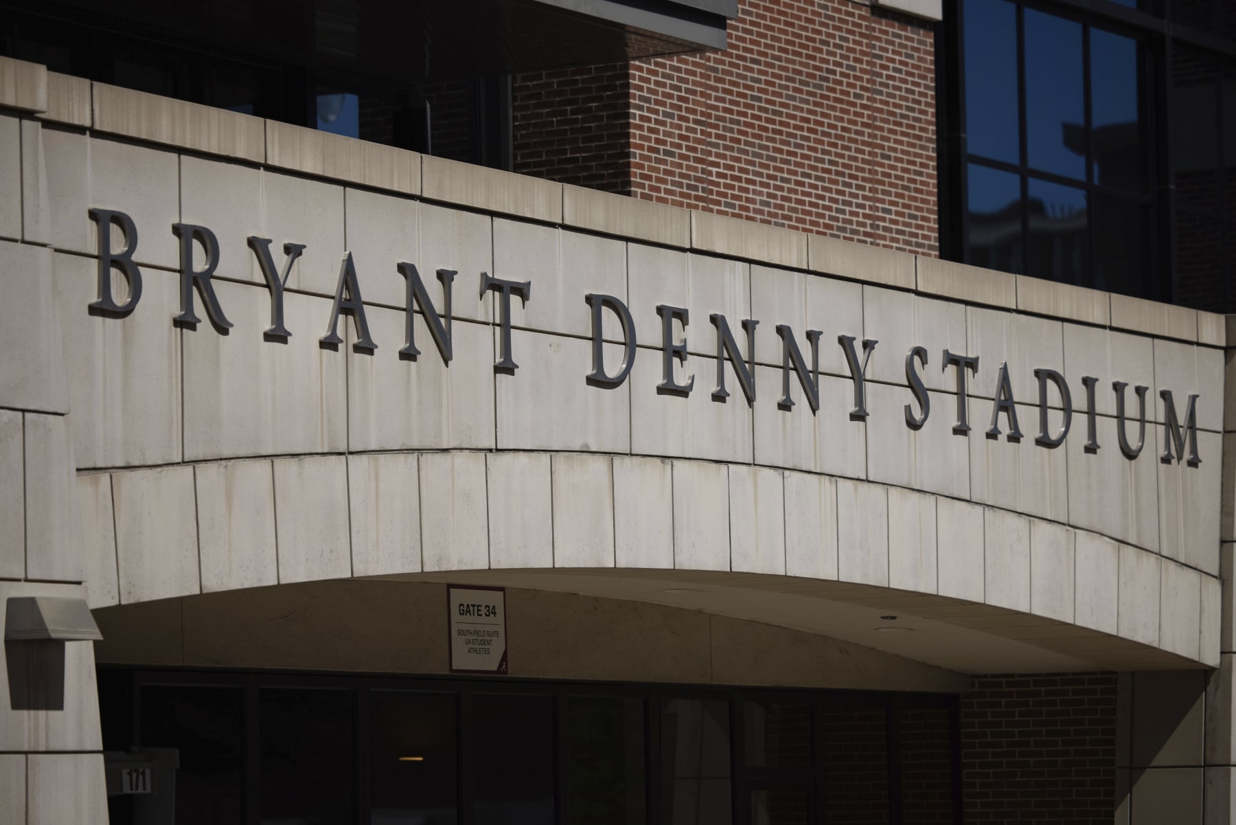 Detail shot of Bryant-Denny Stadium signage as Alabama, playing against Texas A&M, and its fans adjust to the new 'Covid normal' on NCAA college football game day, Saturday, Oct. 3, 2020, in Tuscaloosa, Ala. A restricted number of fans were allowed to attend the game, meaning many did not travel to the city, while others sought social opportunities at restaurants and bars. (AP Photo/Vasha Hunt)