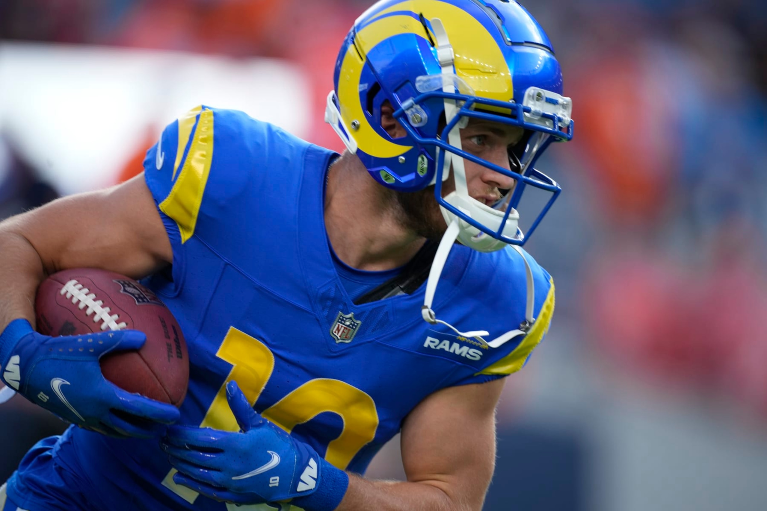 Los Angeles Rams wide receiver Cooper Kupp (10) warms up before an NFL preseason football game Saturday, Aug. 26, 2023, in Denver. (AP Photo/David Zalubowski)