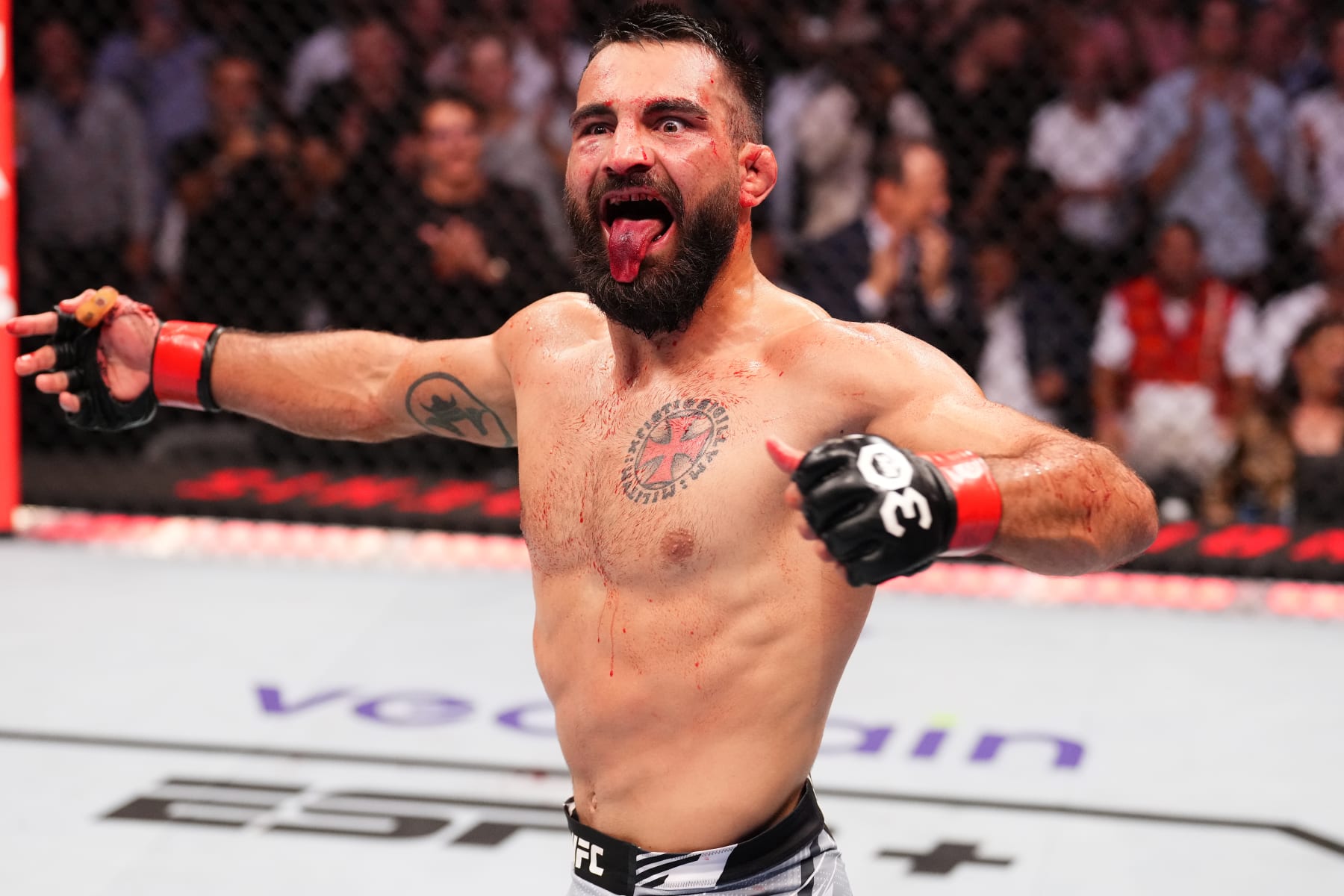 PARIS, FRANCE - SEPTEMBER 02: Benoit Saint Denis of France reacts after defeating Thiago Moises of Brazil in a lightweight fight during the UFC Fight Night event at The Accor Arena on September 02, 2023 in Paris, France. (Photo by Josh Hedges/Zuffa LLC via Getty Images)