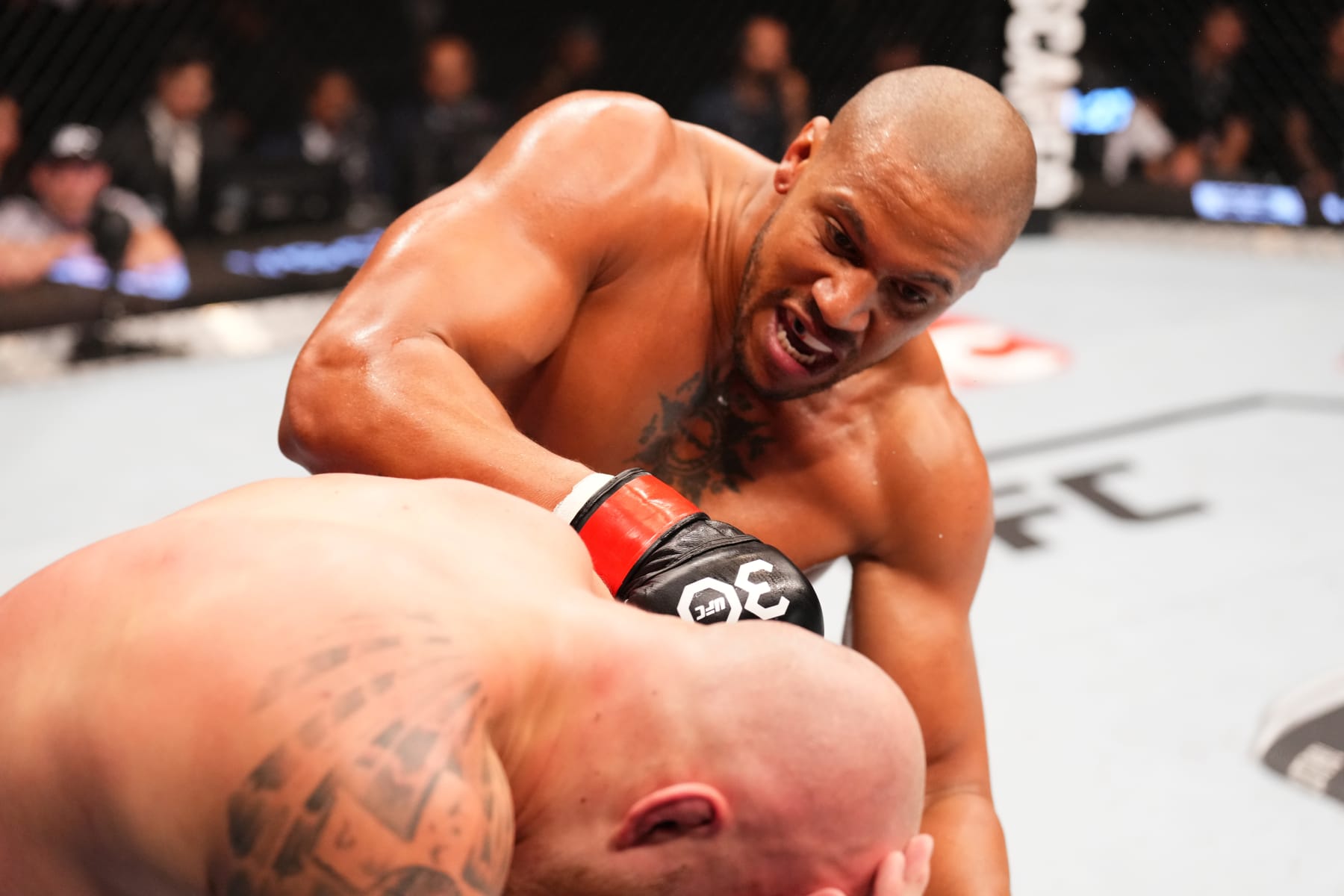 PARIS, FRANCE - SEPTEMBER 02: (R-L) Ciryl Gane of France punches Serghei Spivac of Moldova in a heavyweight fight during the UFC Fight Night event at The Accor Arena on September 02, 2023 in Paris, France. (Photo by Josh Hedges/Zuffa LLC via Getty Images)