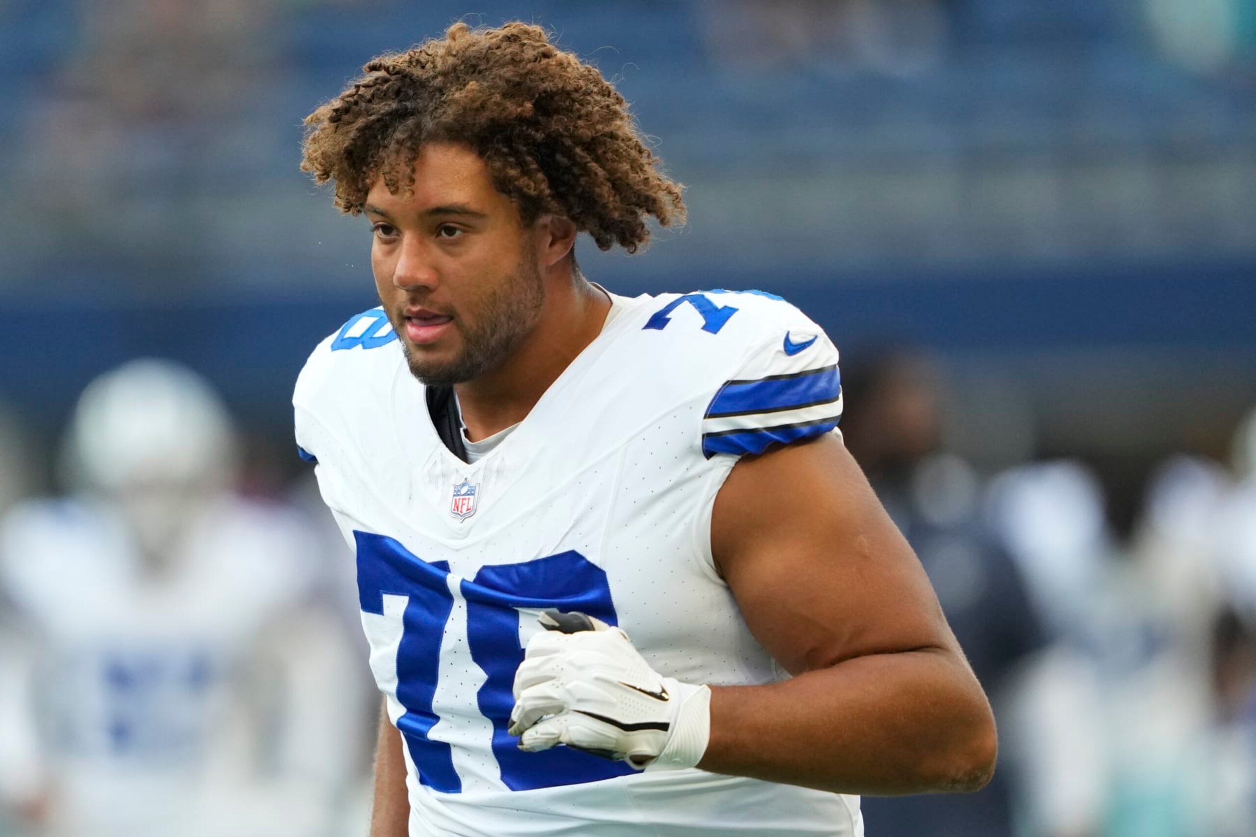 Dallas Cowboys offensive tackle Terence Steele runs before a preseason NFL football game against the Seattle Seahawks, Saturday, Aug. 19, 2023, in Seattle. (AP Photo/Lindsey Wasson)
