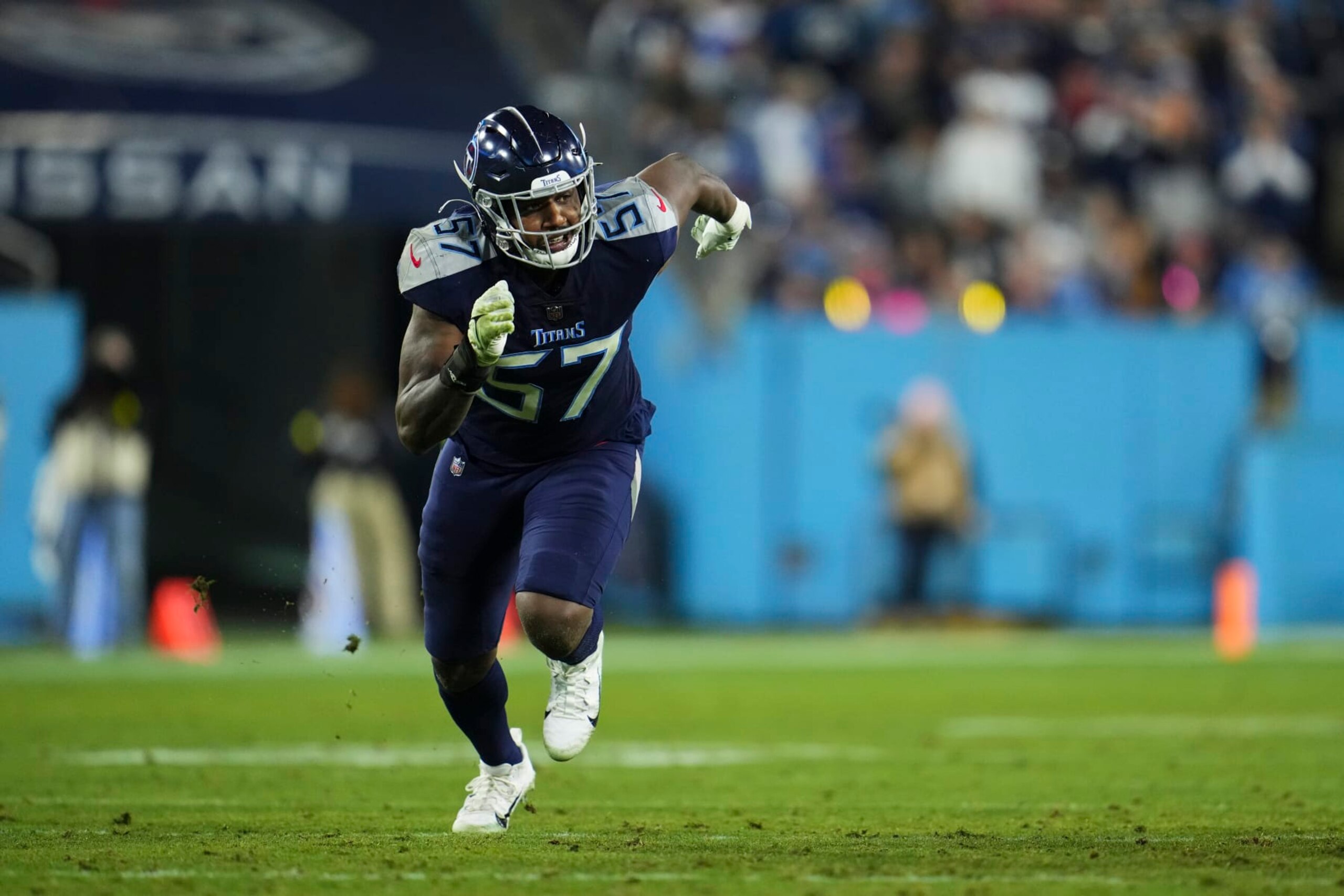 NASHVILLE, TN - DECEMBER 29: Tarell Basham #57 of the Tennessee Titans defends against the Dallas Cowboys at Nissan Stadium on December 29, 2022 in Nashville, Tennessee. (Photo by Cooper Neill/Getty Images)