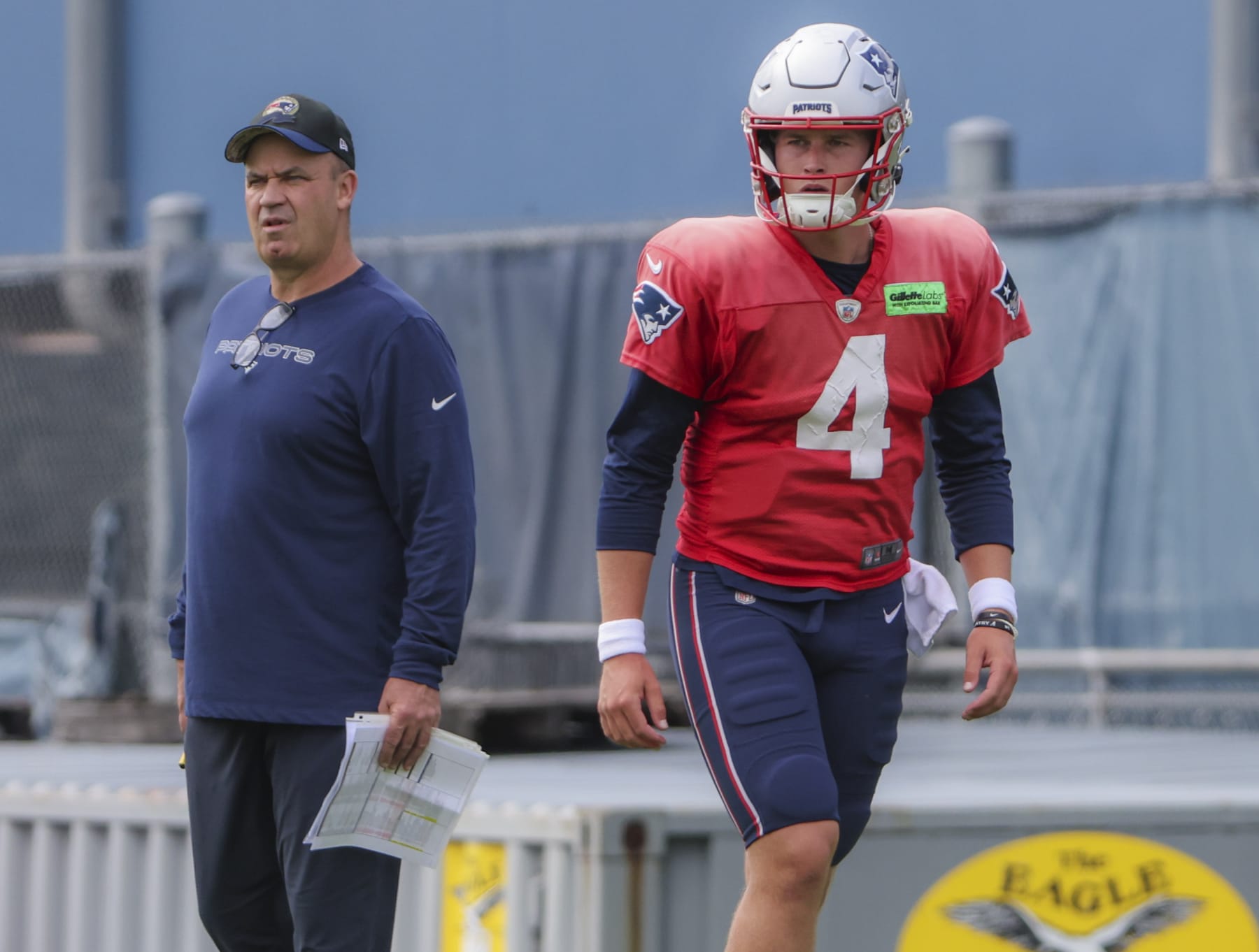Foxborough, MA - August 30: New England Patriots QB Bailey Zappe, right, and offensive coordinator Bill O'Brien. (Photo by Matthew J. Lee/The Boston Globe via Getty Images)