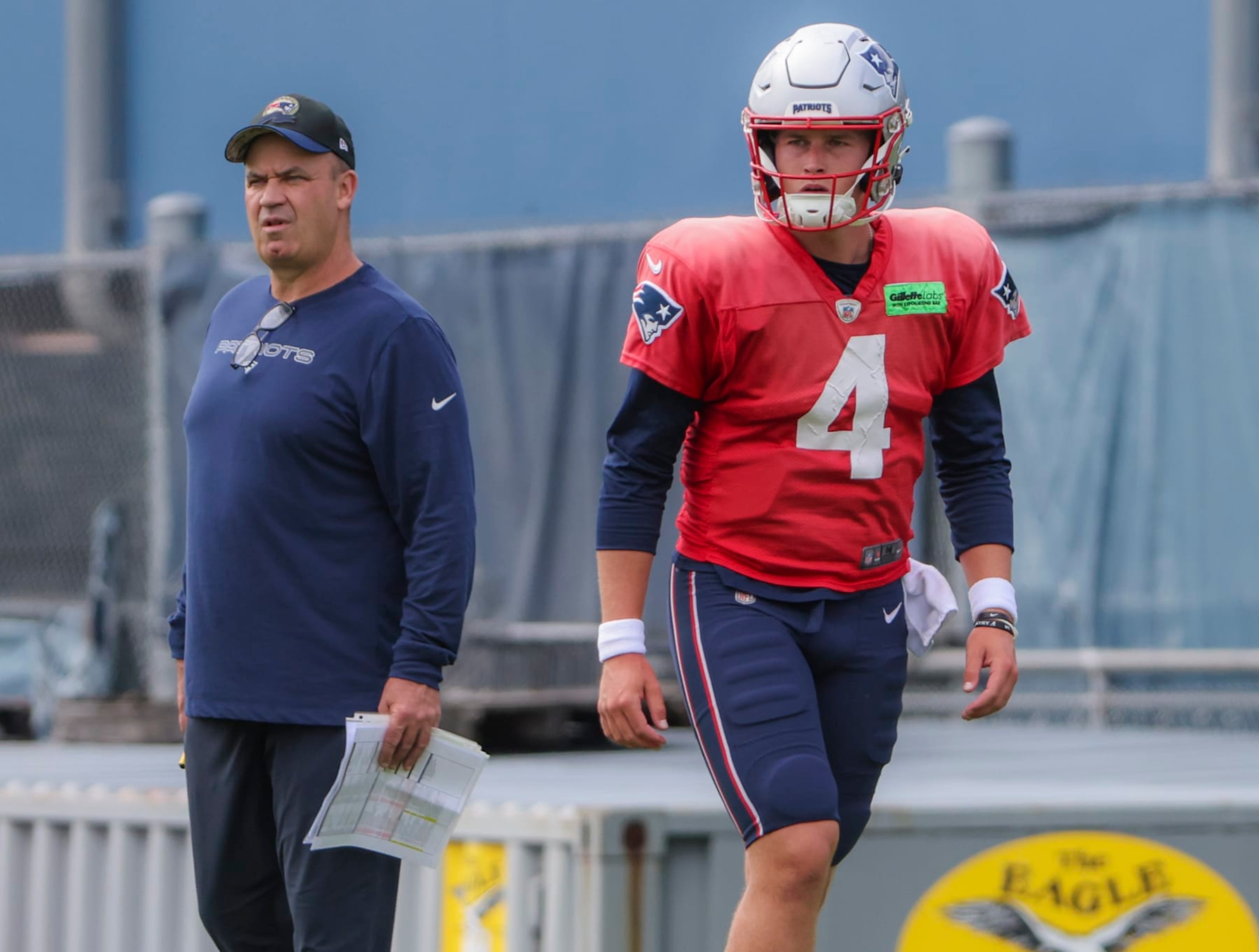 Foxborough, MA - August 30: New England Patriots QB Bailey Zappe, right, and offensive coordinator Bill O'Brien. (Photo by Matthew J. Lee/The Boston Globe via Getty Images)