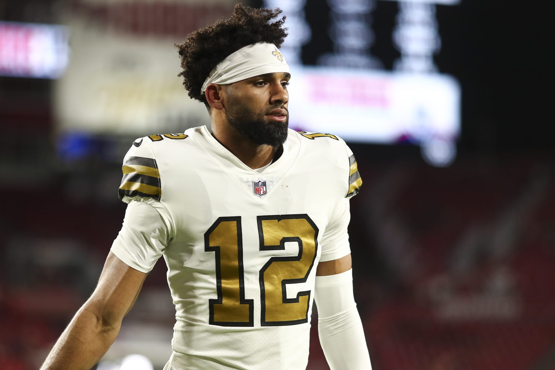 TAMPA, FL - DECEMBER 5: Chris Olave #12 of the New Orleans Saints warms up prior to an NFL football game against the Tampa Bay Buccaneers at Raymond James Stadium on December 5, 2022 in Tampa, Florida. (Photo by Kevin Sabitus/Getty Images)