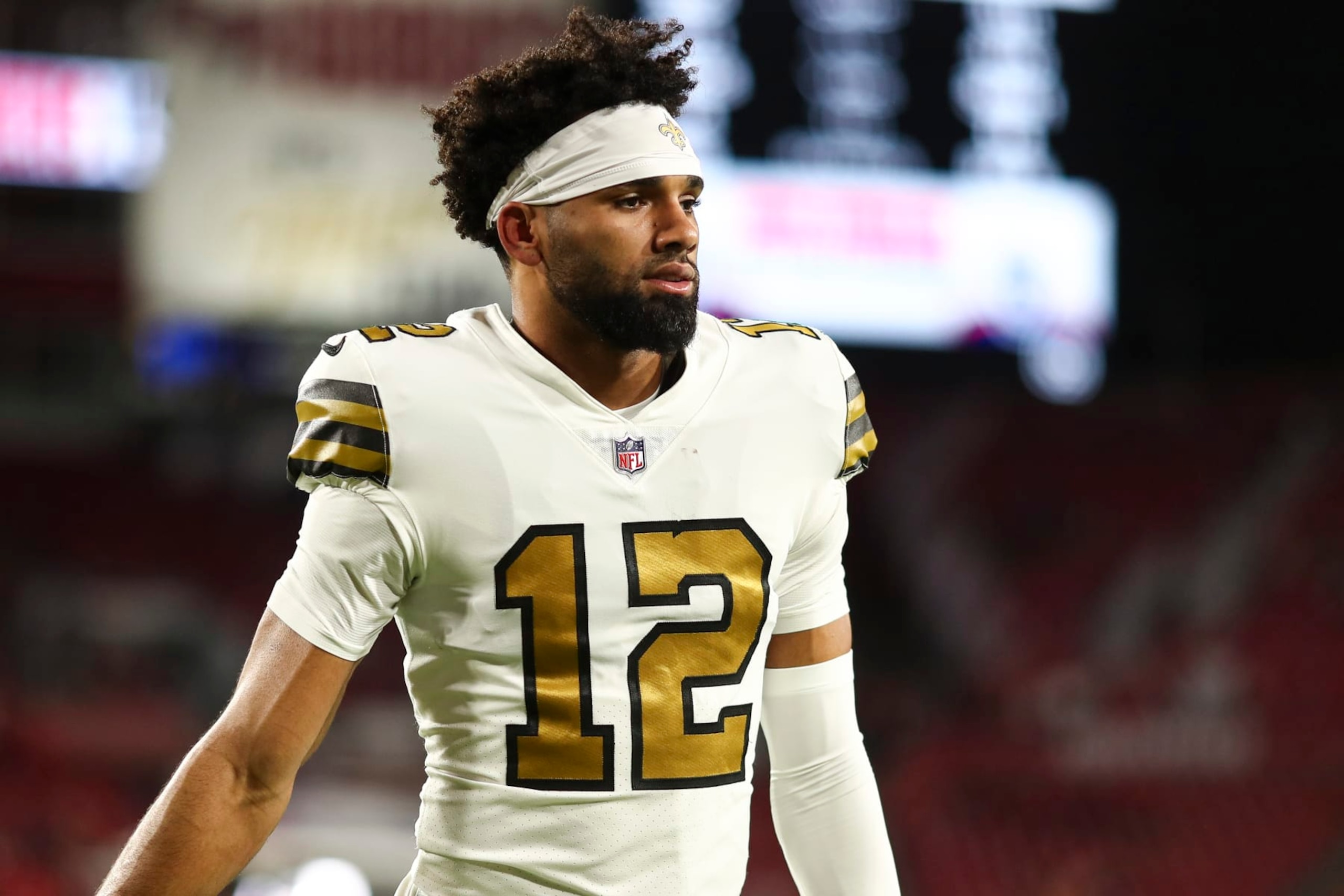 TAMPA, FL - DECEMBER 5: Chris Olave #12 of the New Orleans Saints warms up prior to an NFL football game against the Tampa Bay Buccaneers at Raymond James Stadium on December 5, 2022 in Tampa, Florida. (Photo by Kevin Sabitus/Getty Images)