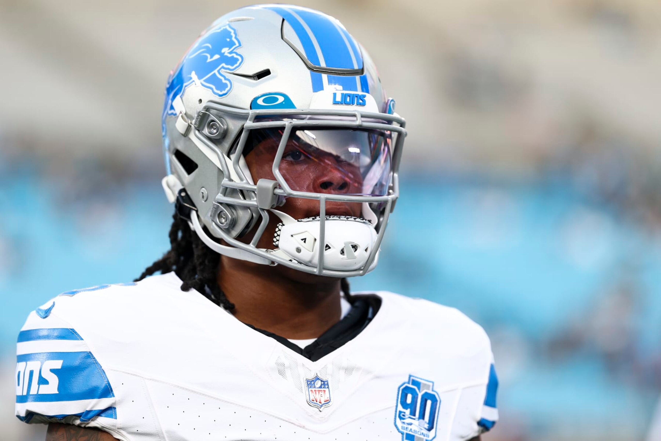 CHARLOTTE, NC - AUGUST 25: Jahmyr Gibbs #26 of the Detroit Lions warms up prior to an NFL preseason football game against the Carolina Panthers at Bank of America Stadium on August 25, 2023 in Charlotte, North Carolina. (Photo by Kevin Sabitus/Getty Images)