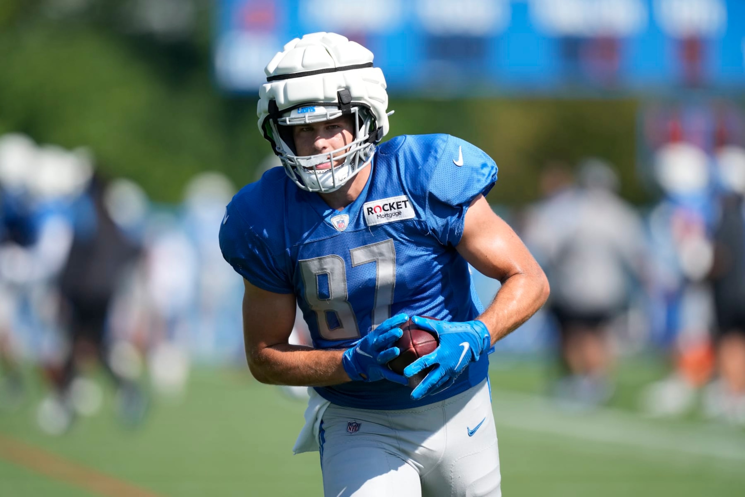 Detroit Lions tight end Sam LaPorta runs during an NFL football practice, Wednesday, Aug. 16, 2023, in Allen Park, Mich. (AP Photo/Carlos Osorio)